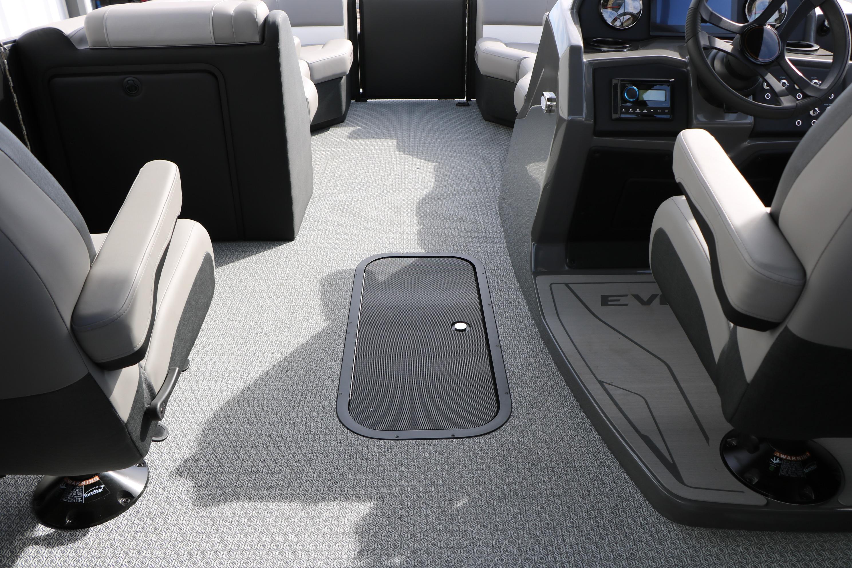 Interior of 2026 Evotti 521QL boat with modern seating and steering console.
