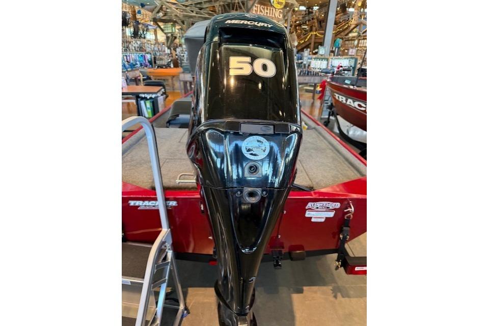 2025 Tracker Bass Tracker Classic XL with Mercury 50 HP outboard motor in showroom.