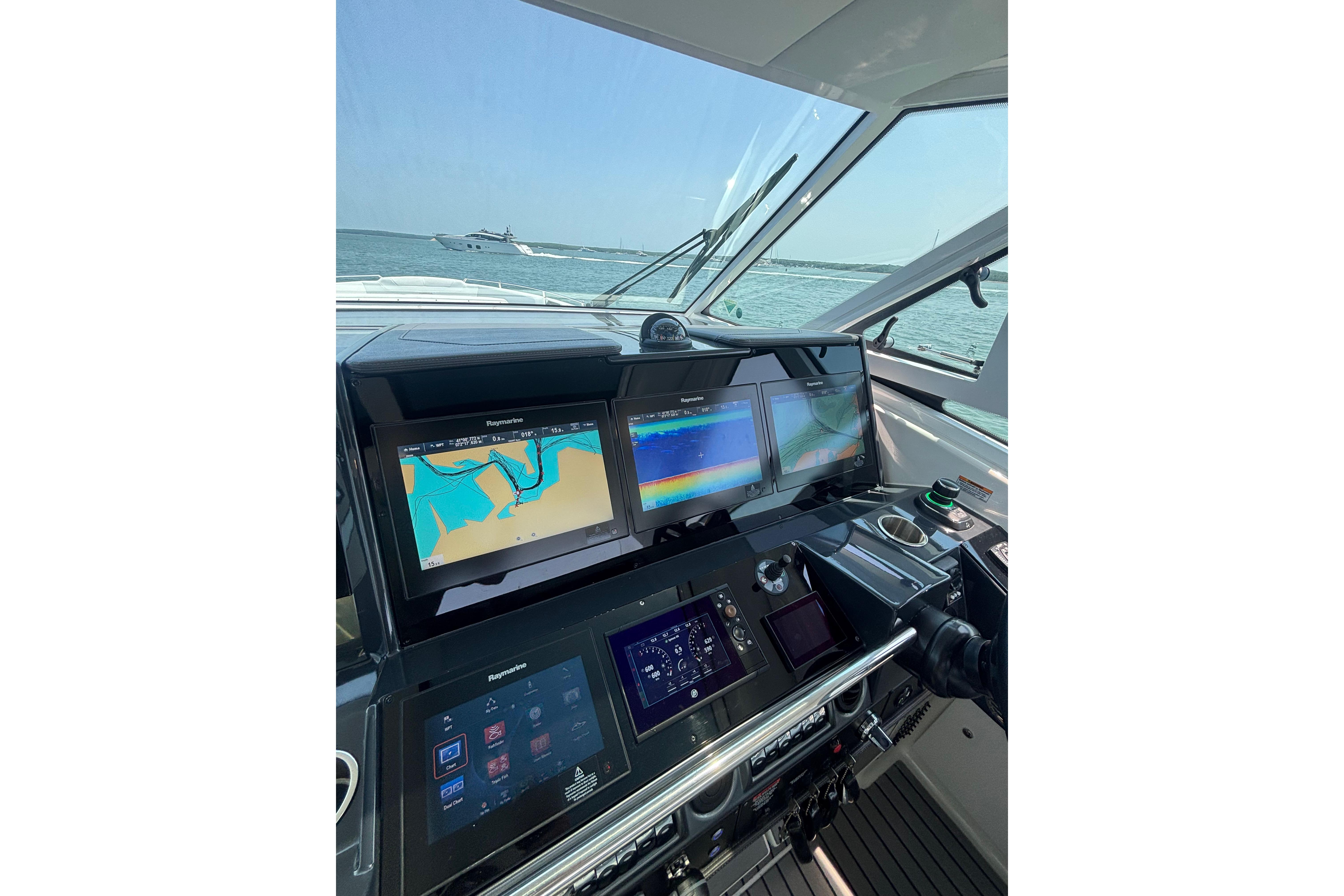Cockpit view of 2019 Formula 430 Super Sport Crossover with navigation screens.