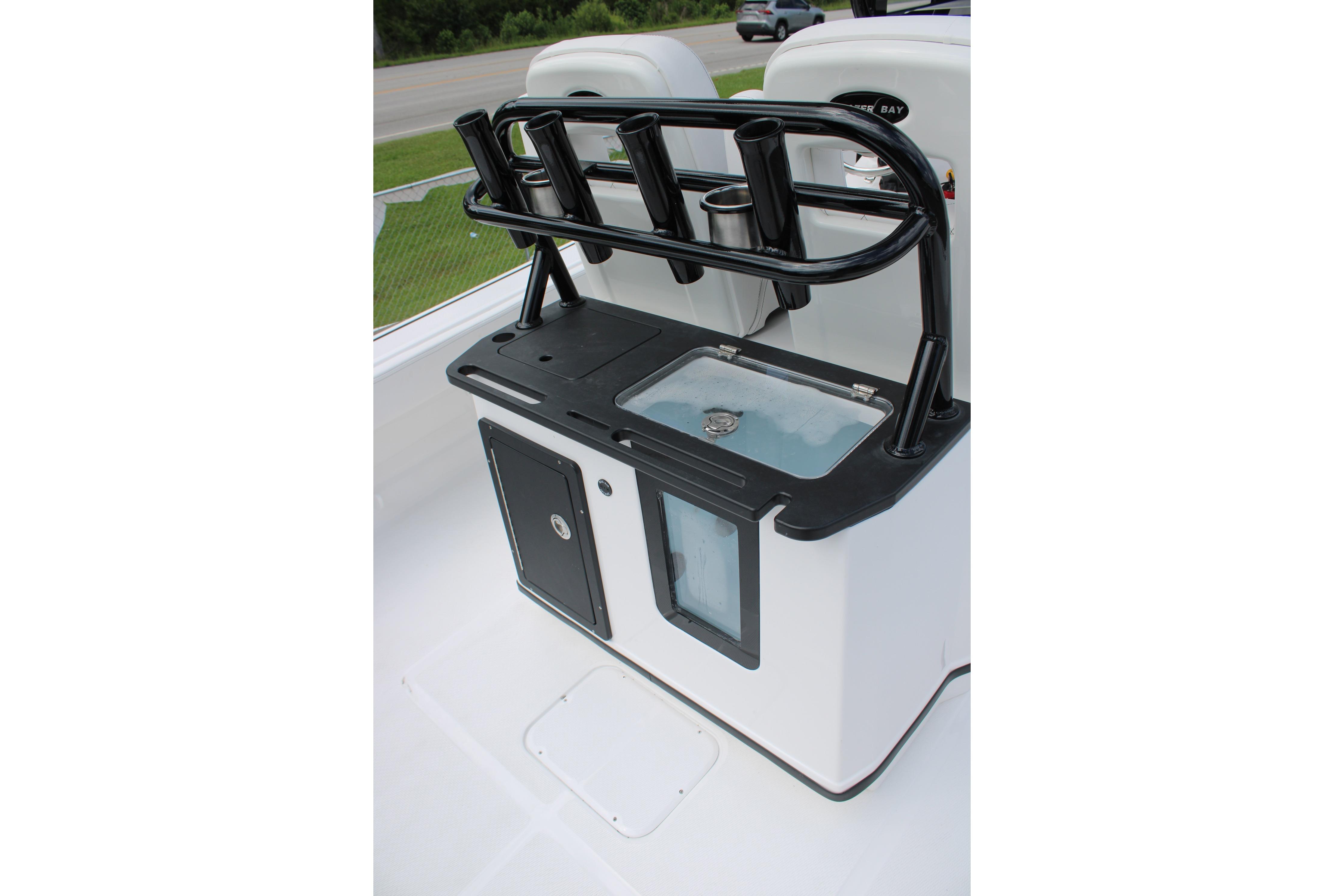 2027 Blazer Bay Makaira 2800 boat console with rod holders and storage compartments.