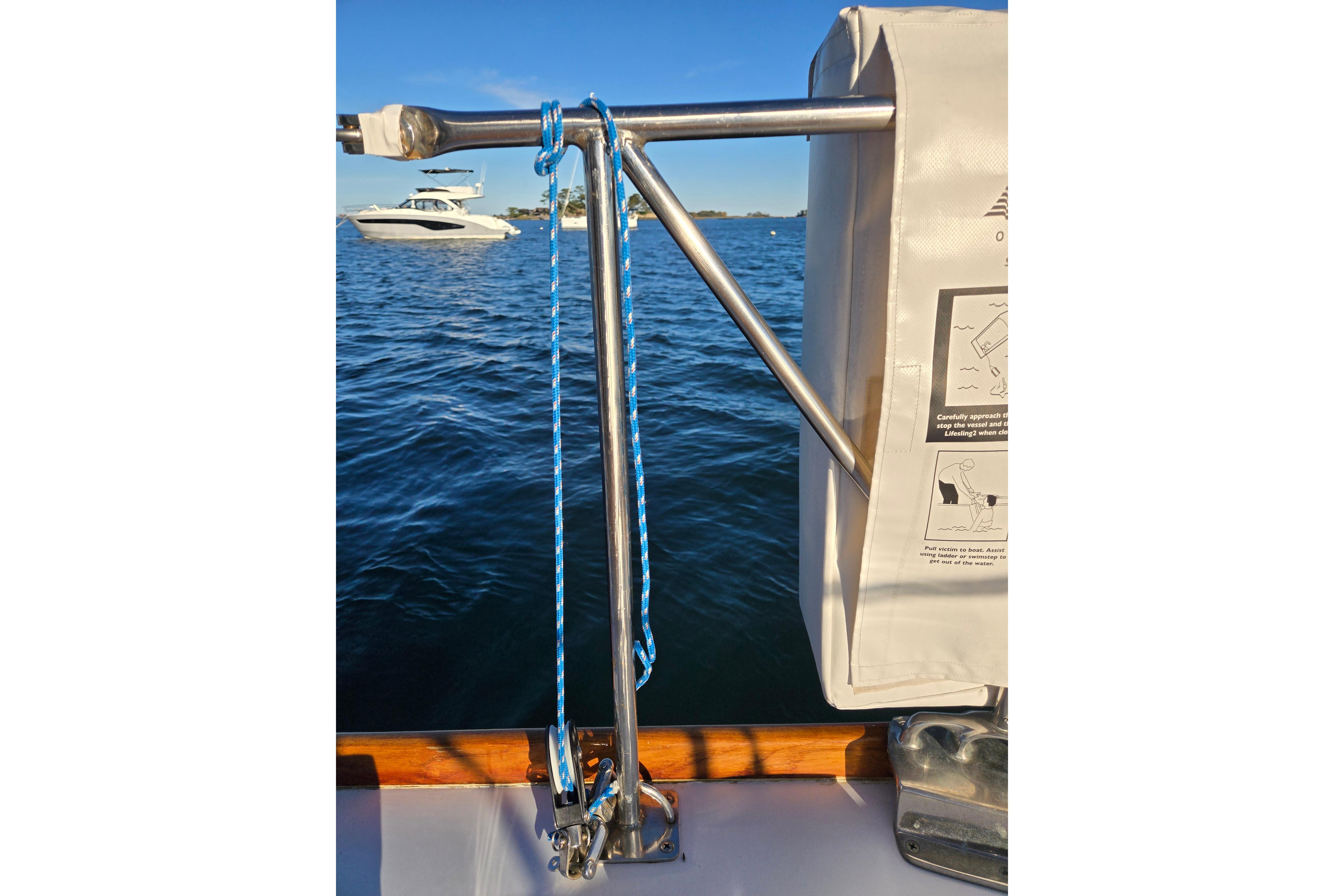Hinckley Bermuda 40 sailboat deck with safety equipment and ocean view, 1970 model.