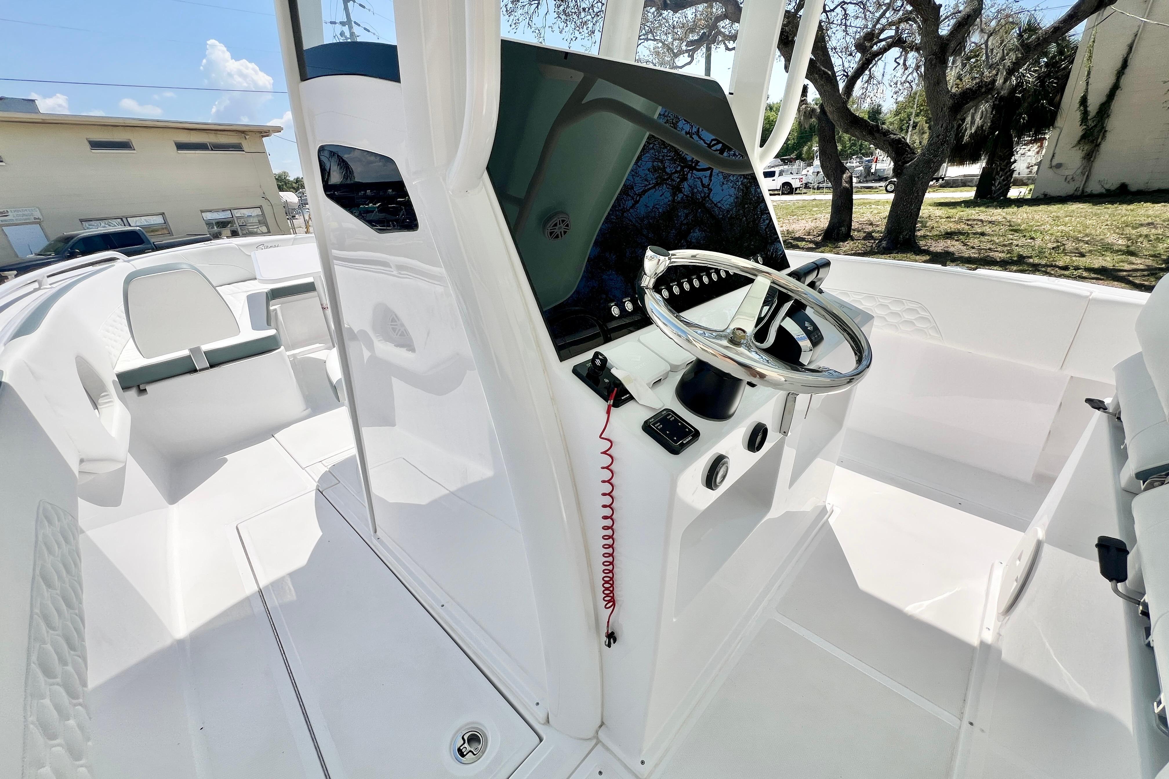 2026 Stamas 31T Aventura boat interior with sleek helm and modern seating.