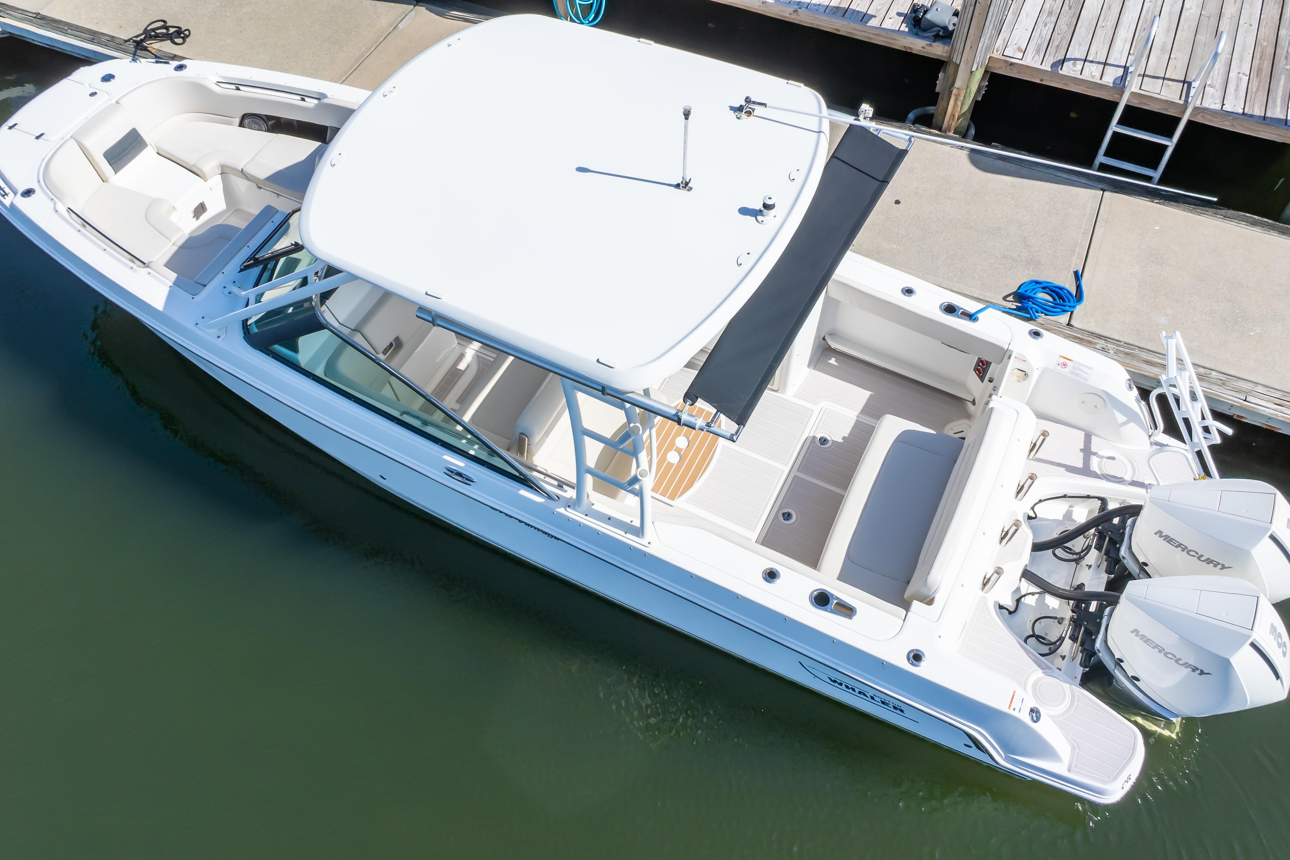2019 Boston Whaler 270 Vantage boat docked, aerial view.