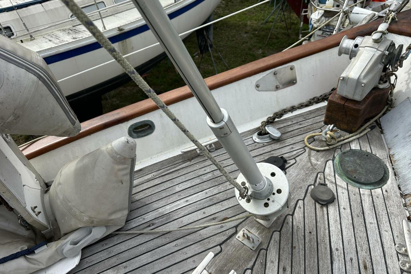 Deck of 1986 Pan-Oceanic 46 sailboat with winch and ropes.
