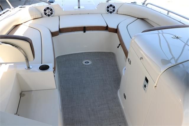 Interior of a 2022 Stingray 212 SC with cushioned seating and speakers.