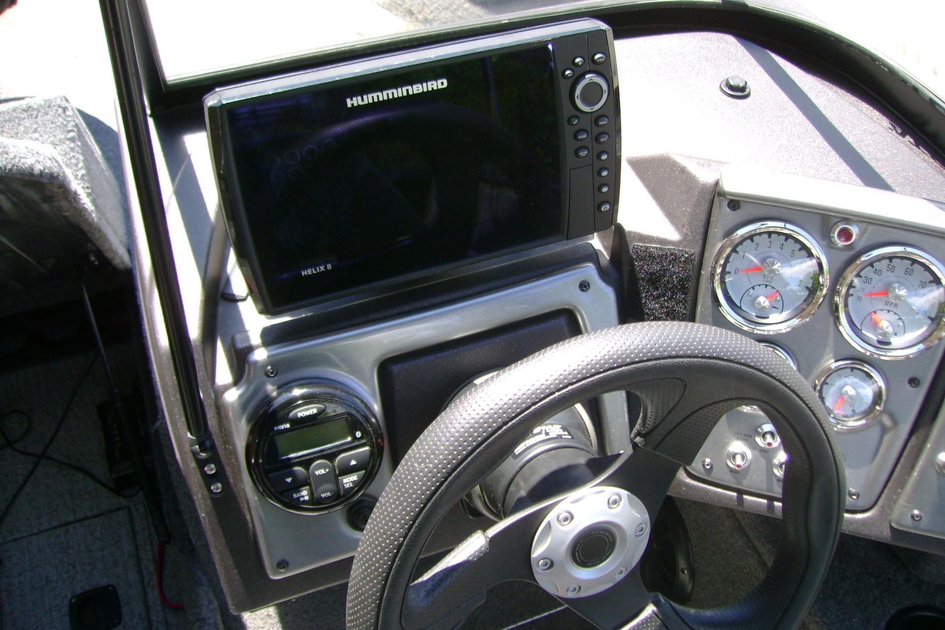 Dashboard of 2023 Tracker Pro Guide V-175 WT with Humminbird Helix 8 fishfinder.