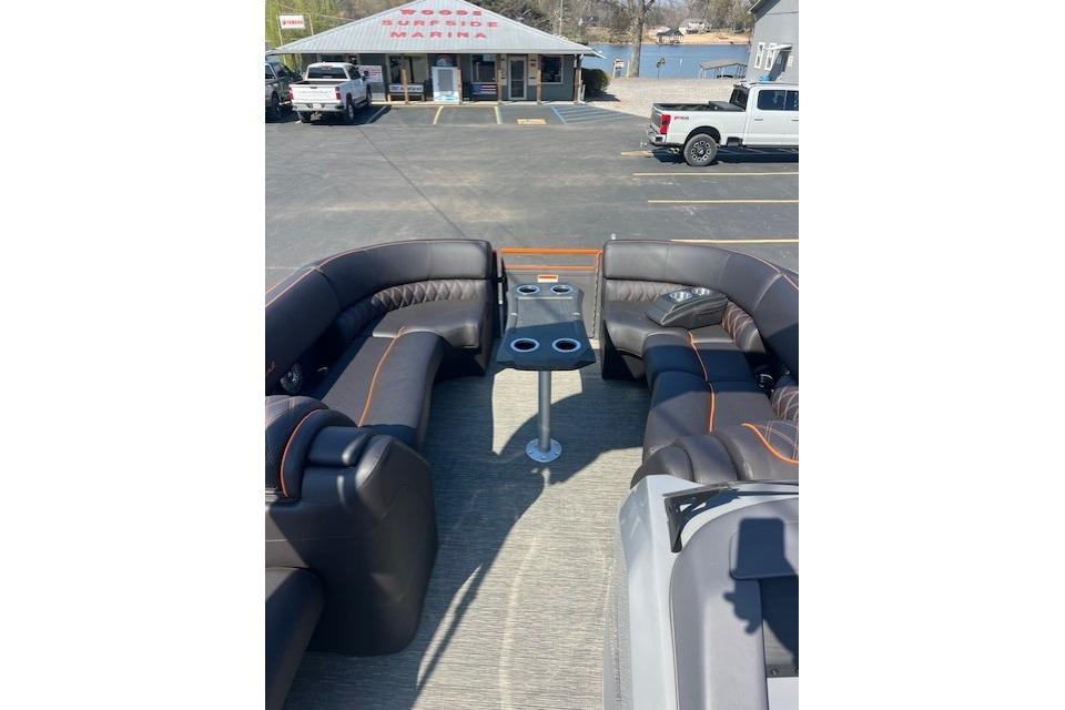 2024 Bennington 23 RXFBA pontoon boat interior with plush seating and cup holders.