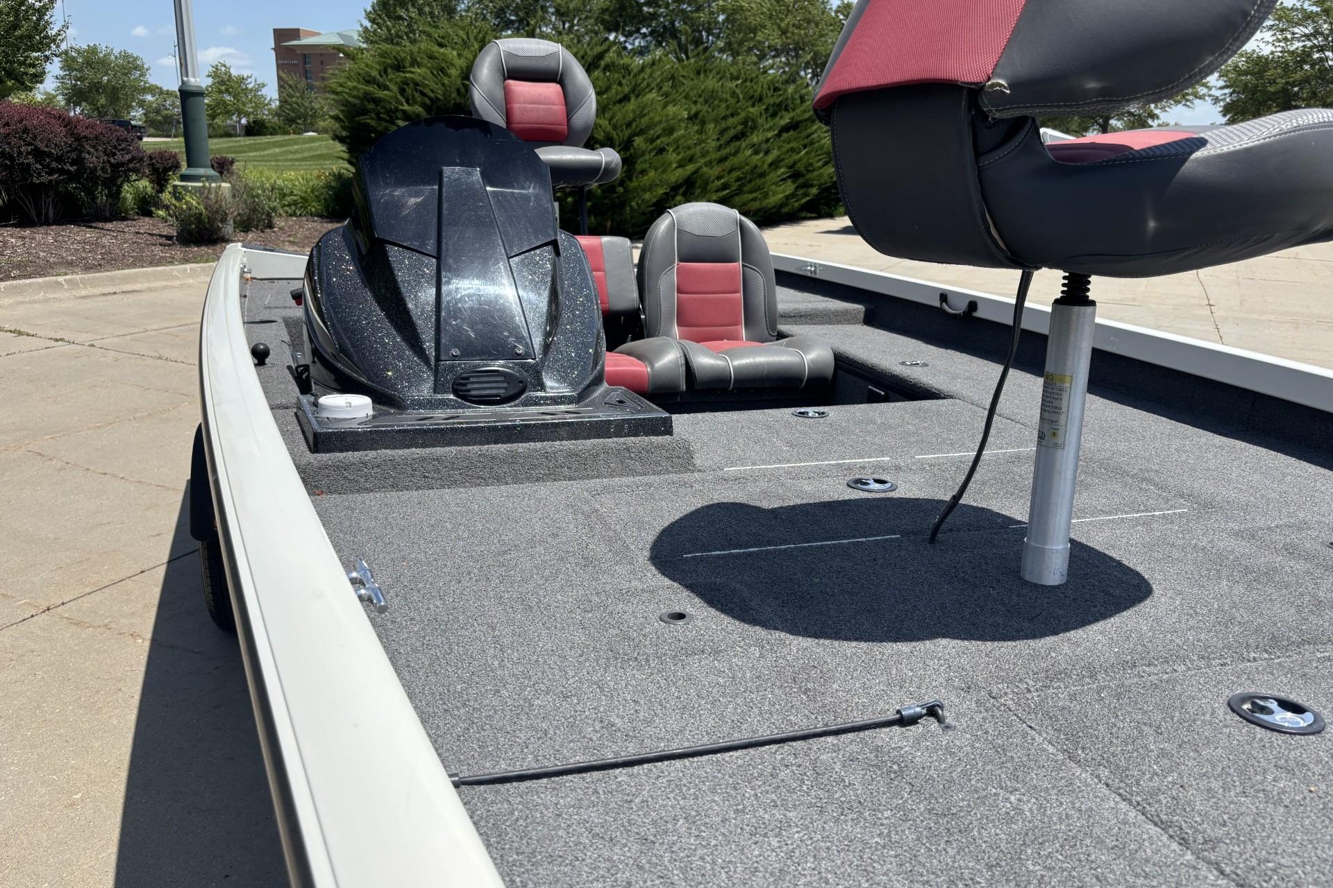2017 Ranger RT178C boat interior with seating and console, parked outdoors.