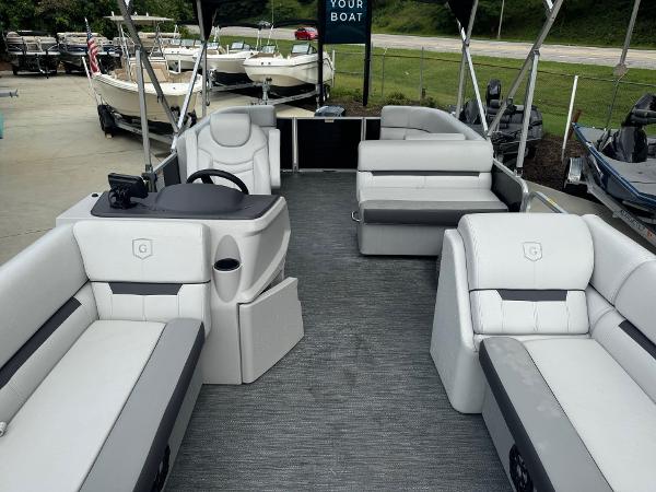 2023 Godfrey 2286 pontoon boat with spacious seating and modern design.