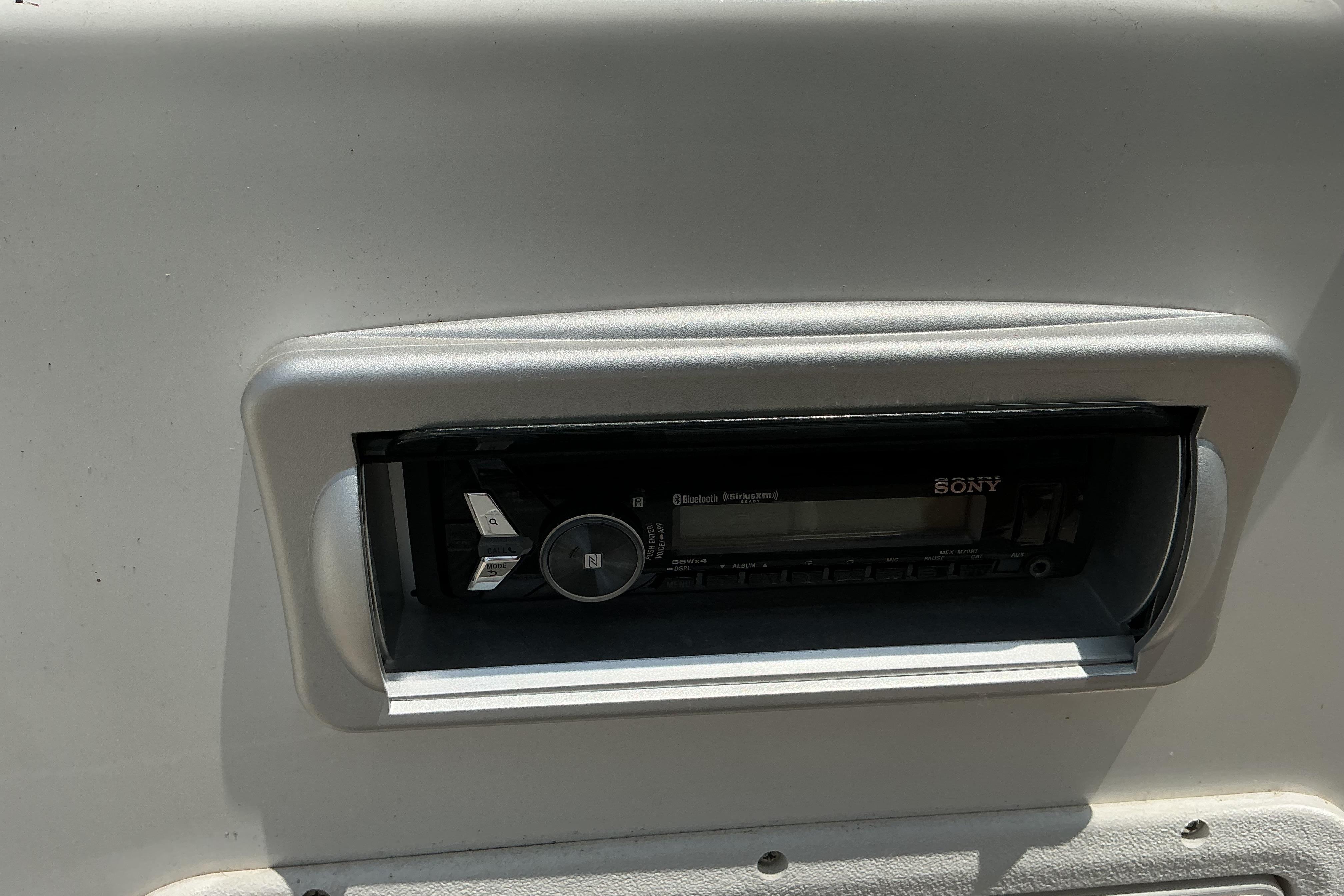 Sony stereo system on 2015 Hurricane SunDeck 187 IO boat dashboard.
