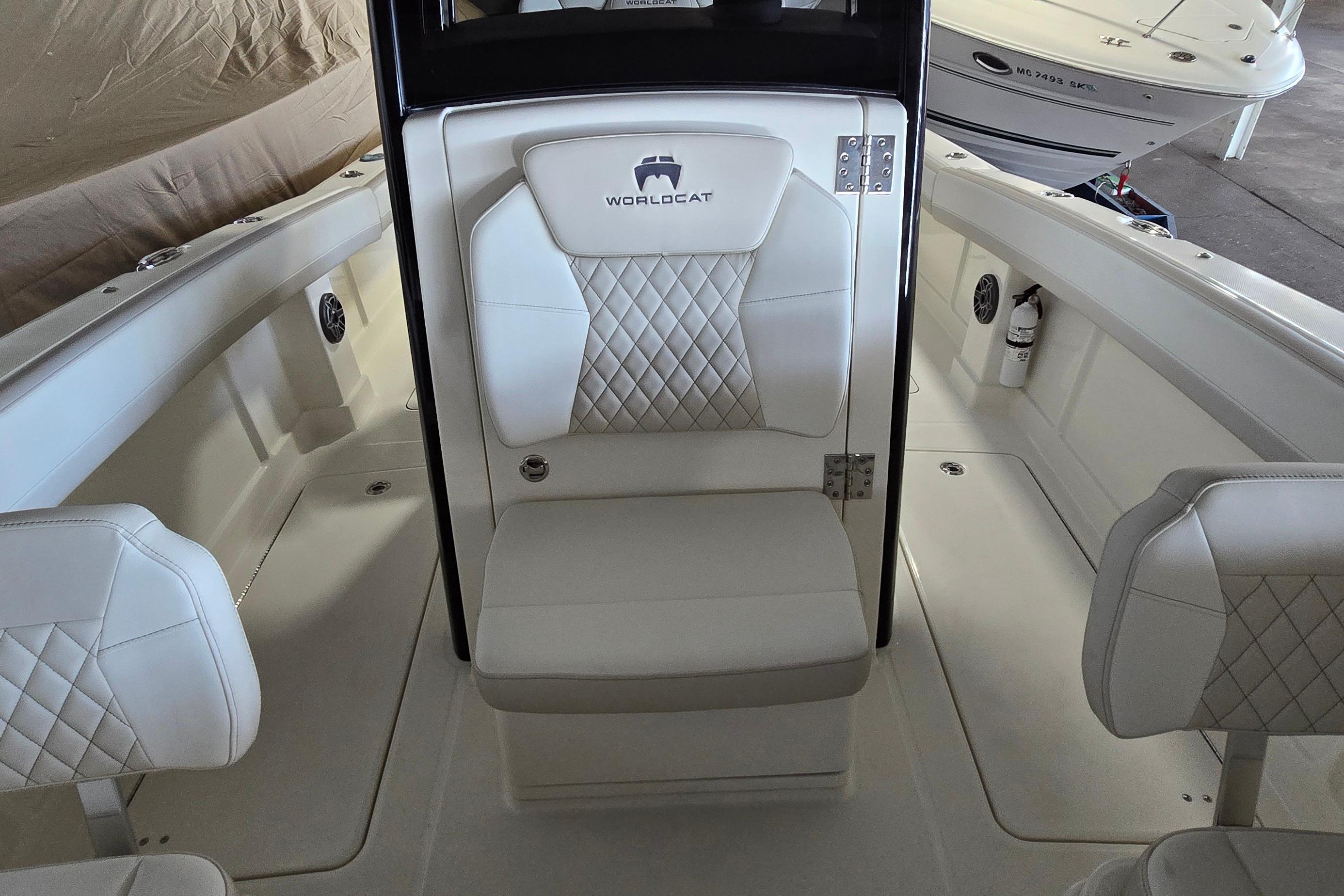 2024 WorldCat 280 CC-X boat interior with white quilted seating and modern design.