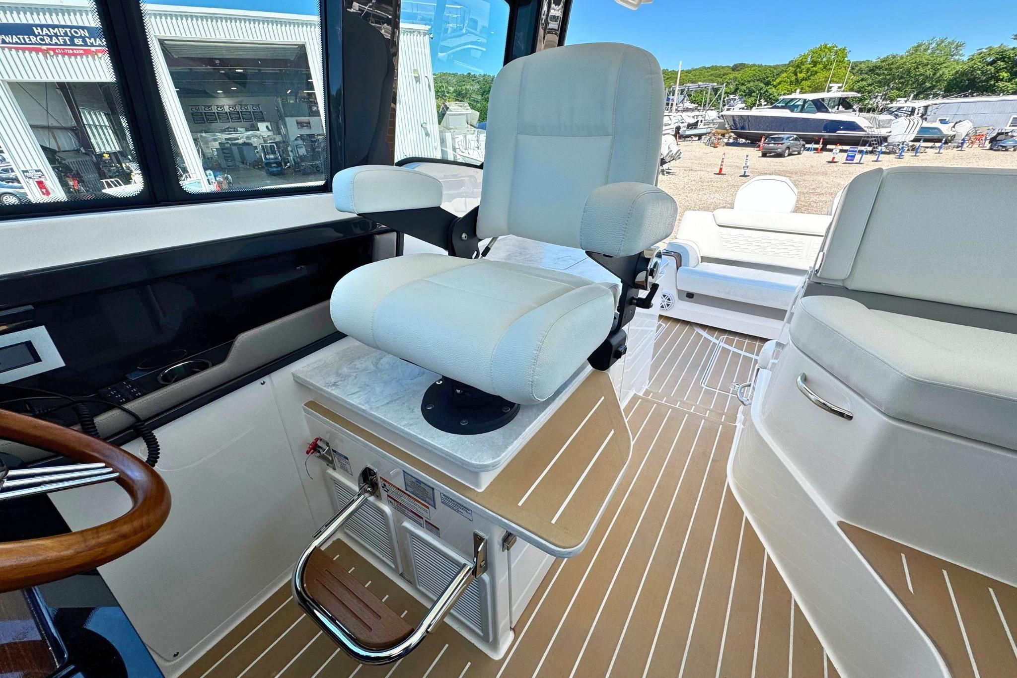 Captain's chair on 2027 Tiara Yachts 39 LE, featuring luxurious interior design.