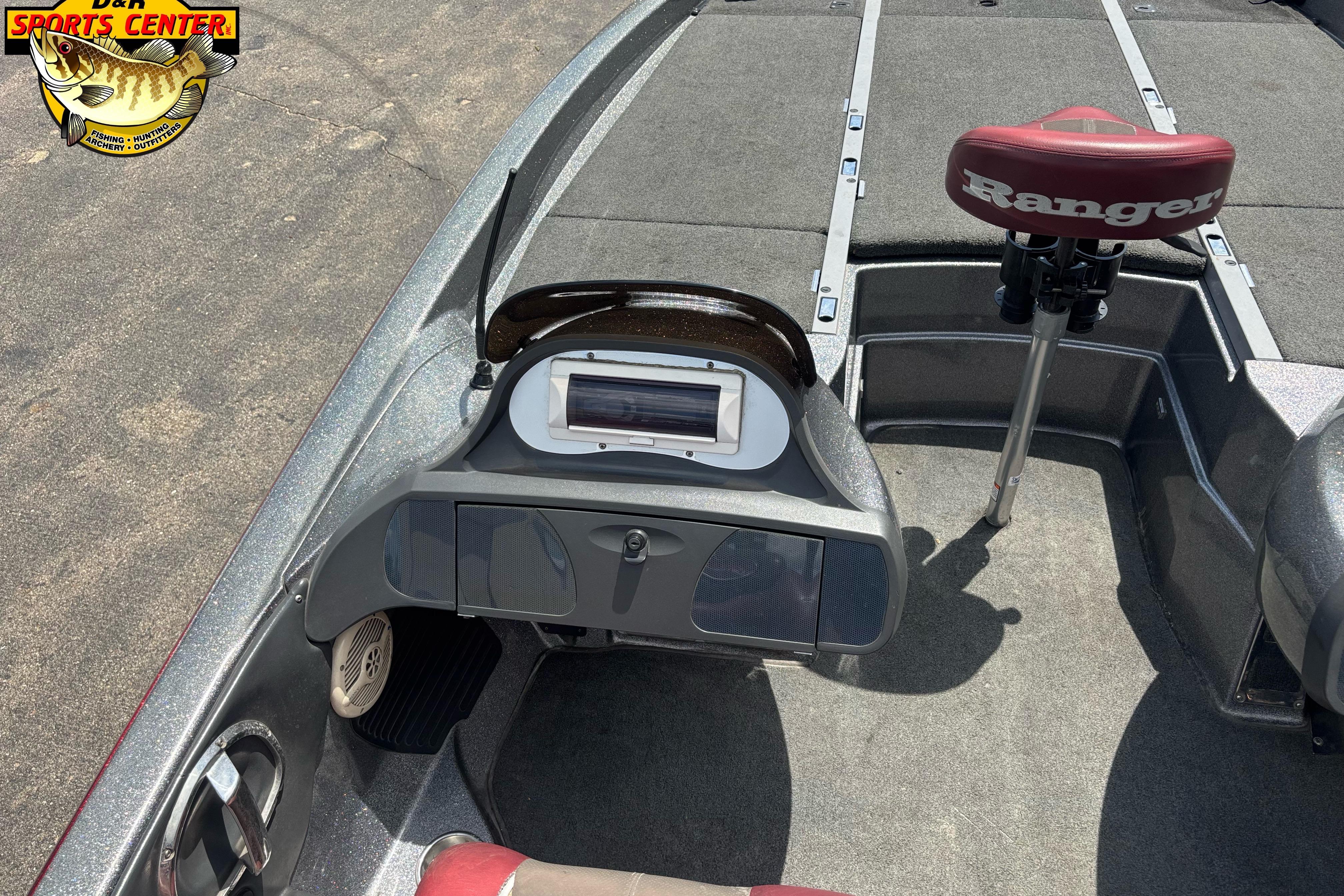2005 Ranger Z21 Comanche boat interior with steering console and branded seat.