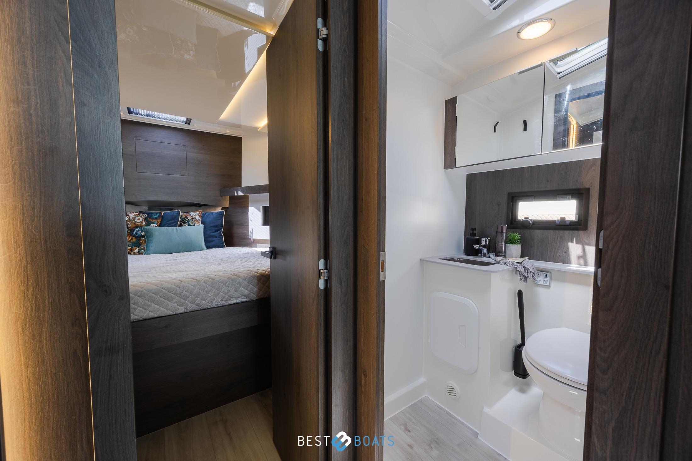 Luxurious interior of 2023 Cobra Yachts Futura 36 Premium Fly, featuring bedroom and bathroom.