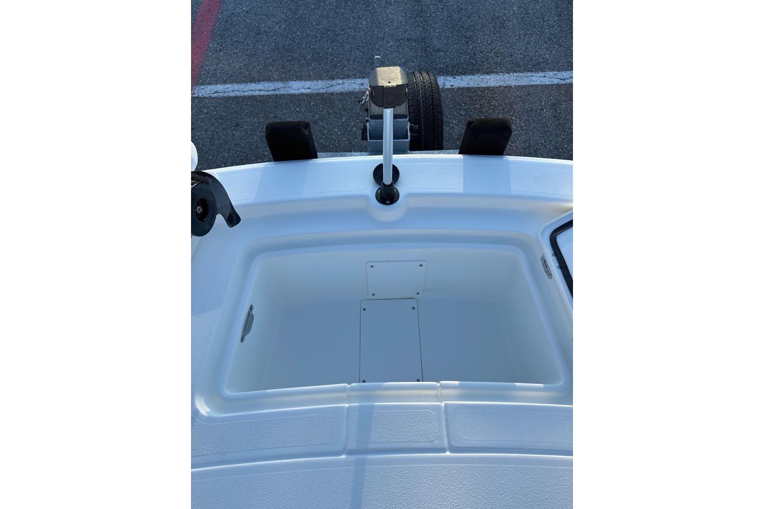 2026 Mako Pro Skiff 13 CC boat interior storage compartment.