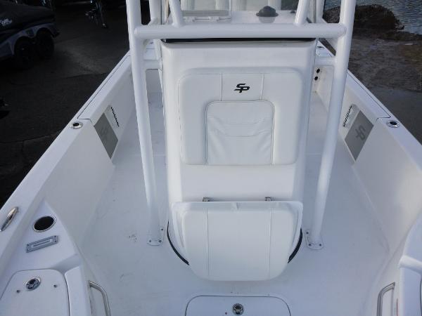 2025 Sea Pro 230 Bay boat interior, featuring white seating and console design.