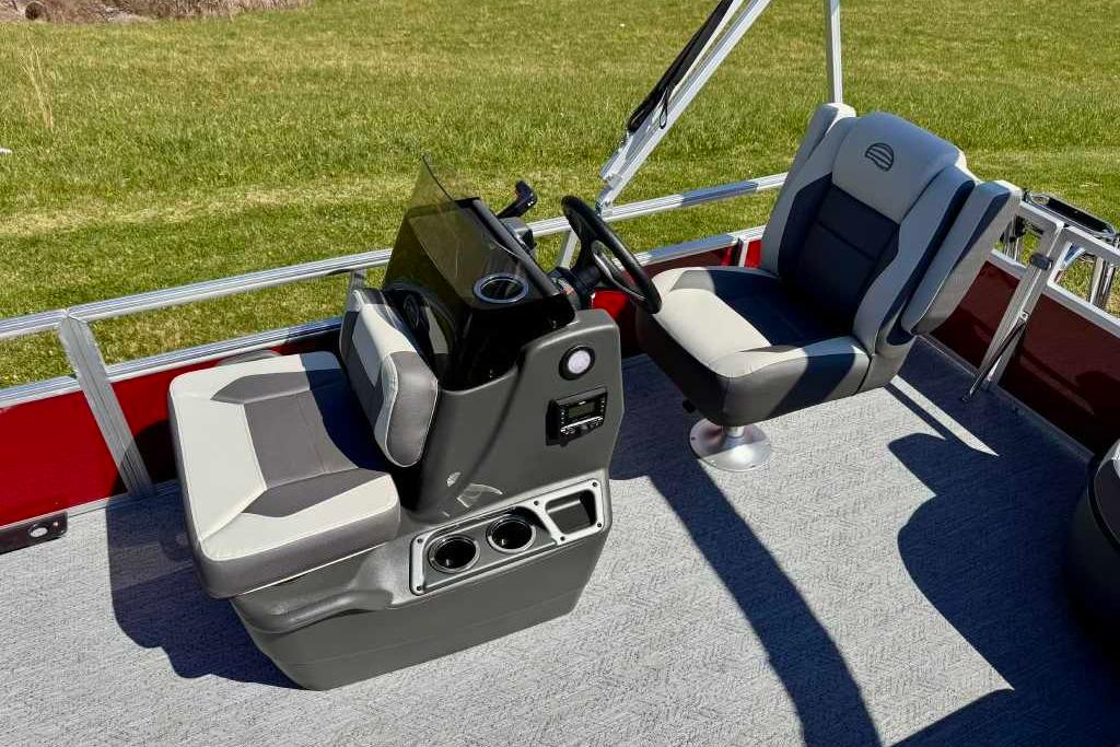 2026 Sun Tracker Bass Buggy 16 XL Select interior with dual seats and steering console.