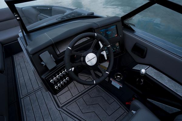 Manufacturer Provided Image: 2026 Moomba Craz boat dashboard with steering wheel and control panel.