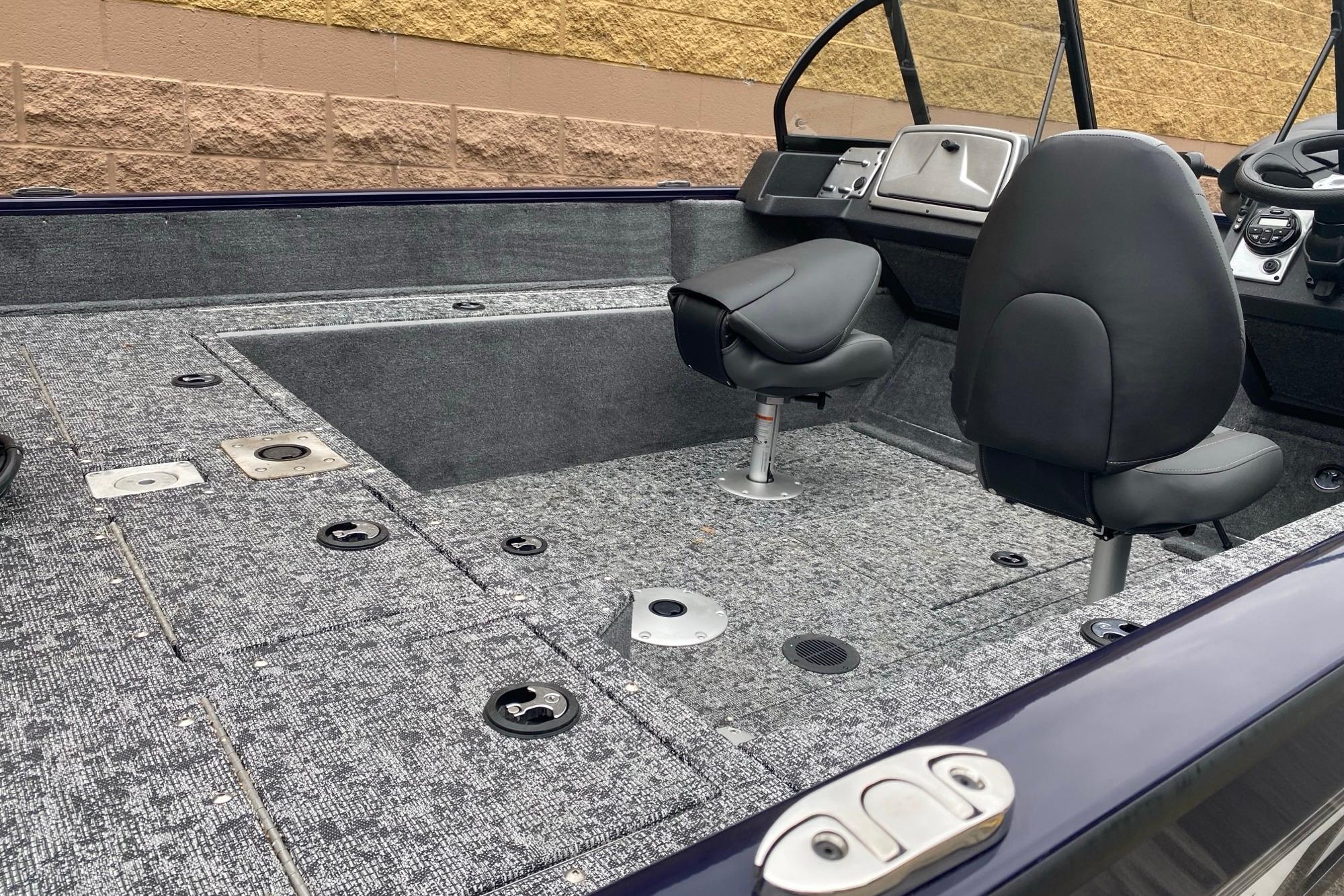 2026 Tracker Pro Guide V-175 WT boat interior with seating and storage compartments.