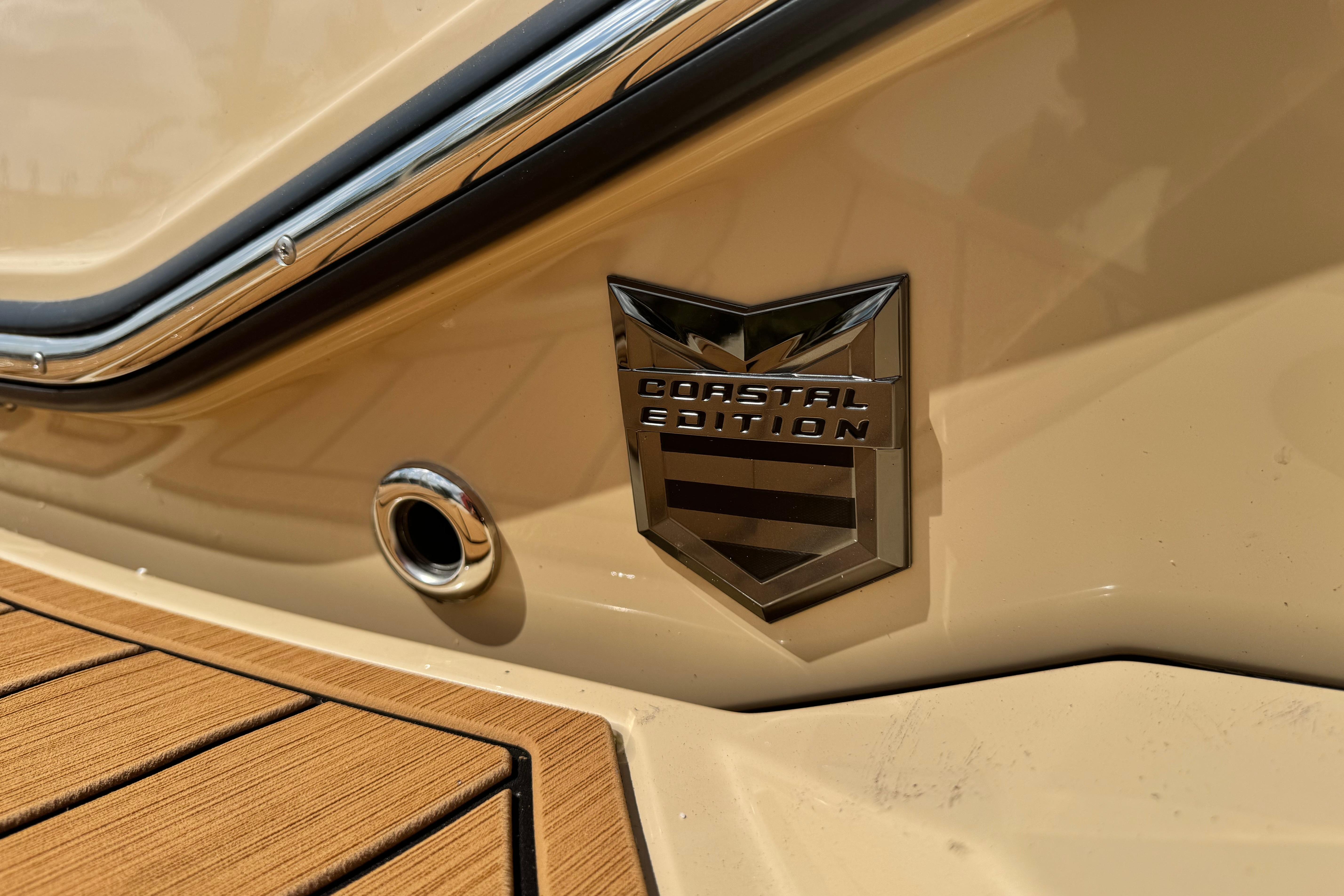 2026 Nautique Super Air Nautique G23 Paragon Coastal Edition badge on beige exterior.