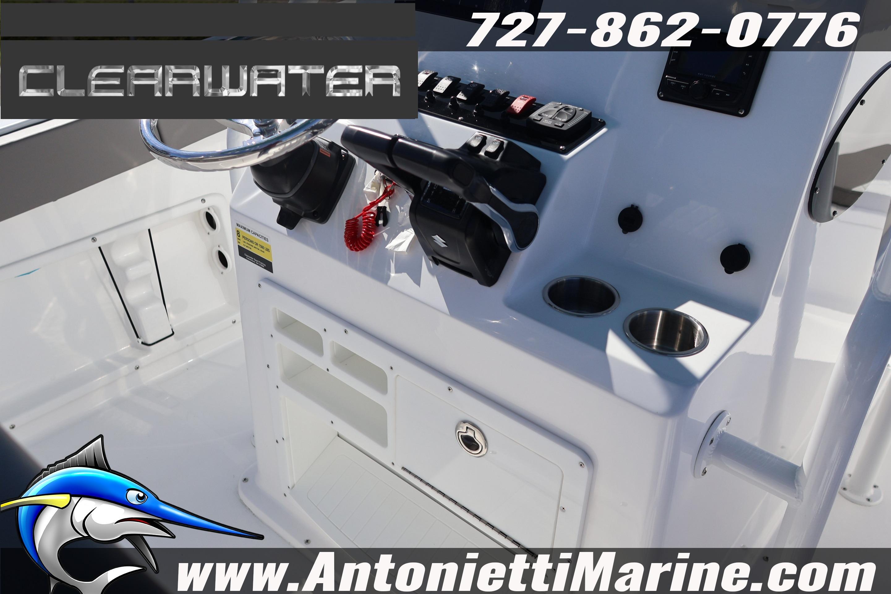 Clearwater 2300 boat console with controls and cup holders, 2026 model.