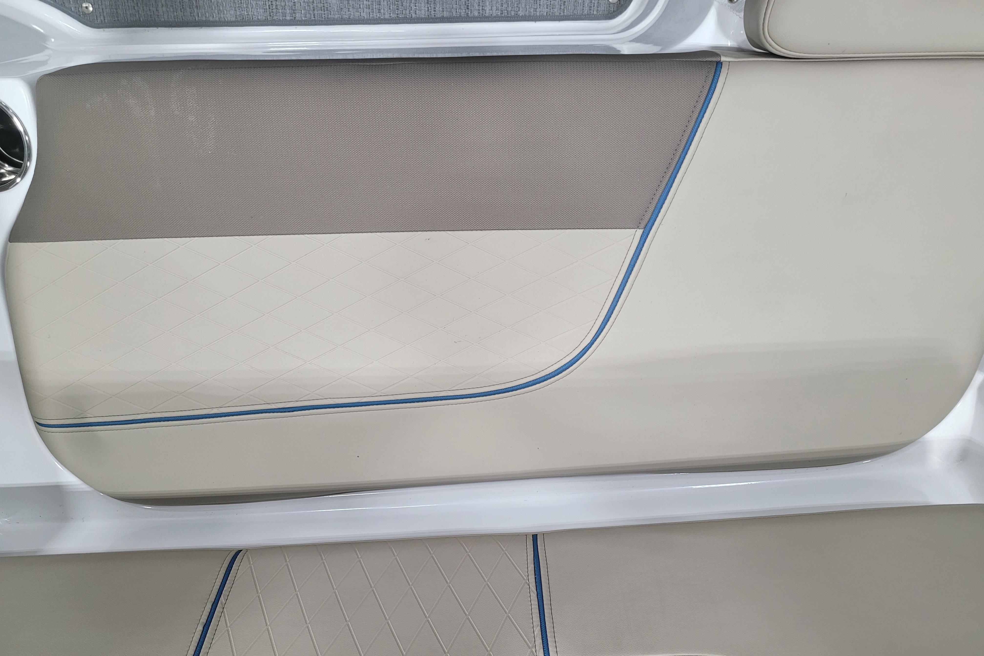 2026 Tahoe 2150 interior panel with beige and blue trim design.