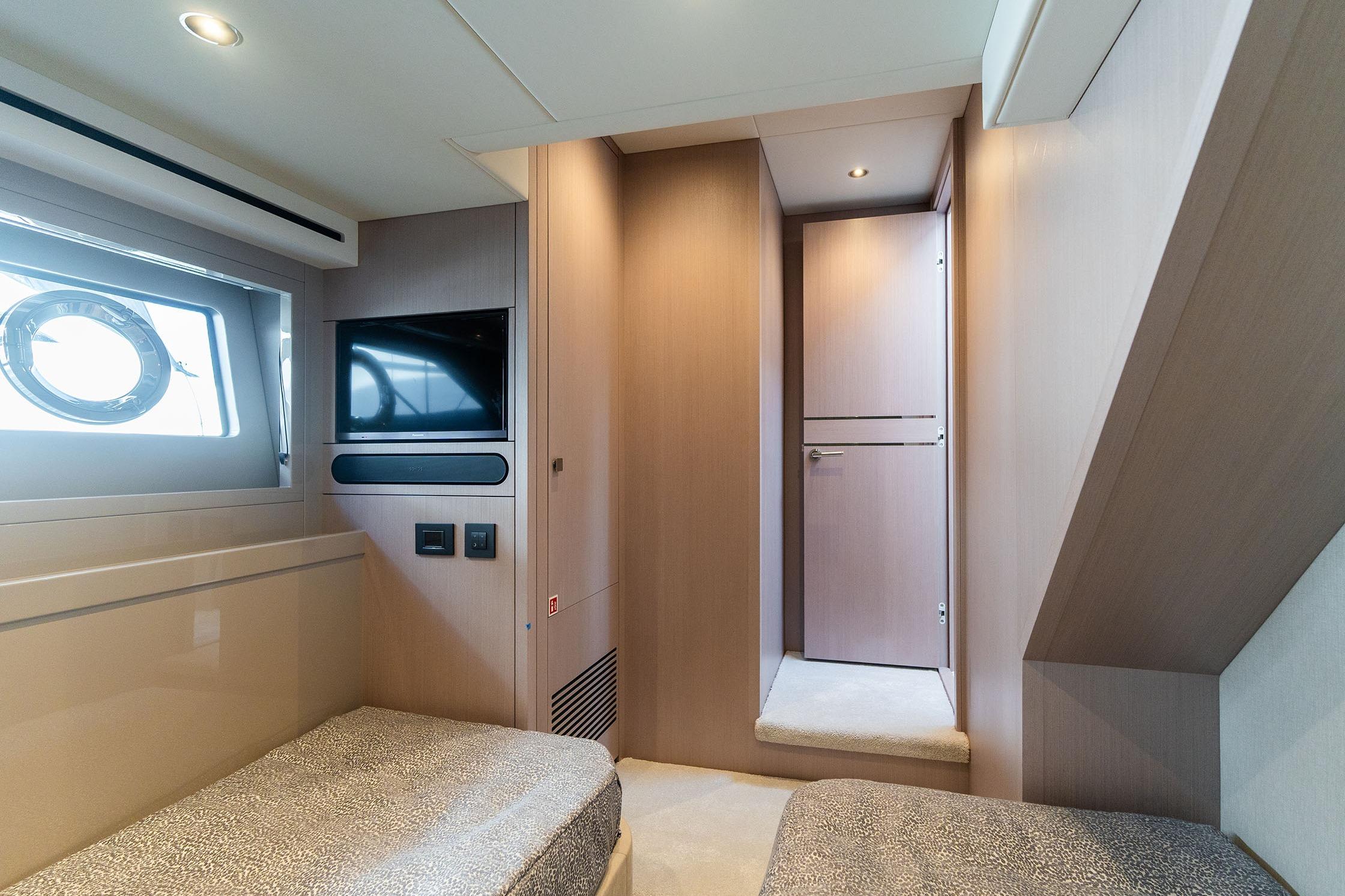 Luxurious interior of 2026 Sunseeker Manhattan 68 yacht cabin with modern amenities.