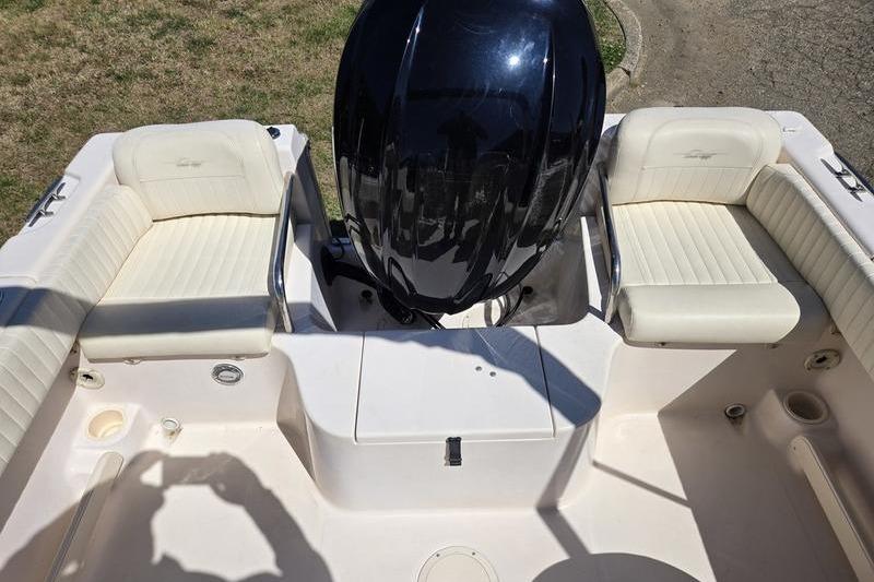 2007 Grady-White Tournament 205 boat interior with seating and outboard motor.