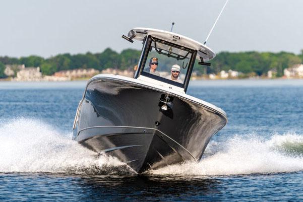 Manufacturer Provided Image: 2026 Sea Hunt Gamefish 27 Coffin Box cruising on water, showcasing sleek design and performance.