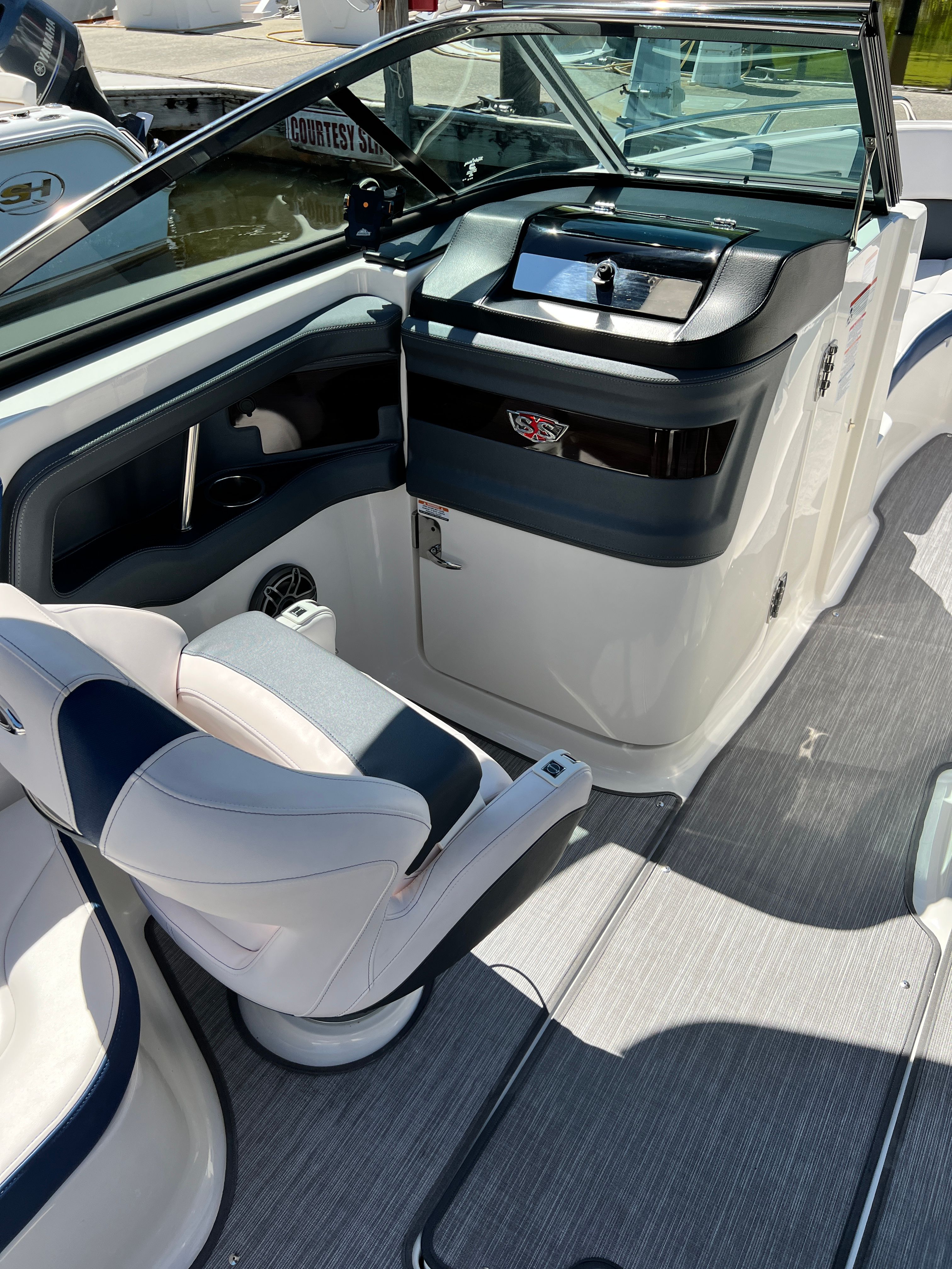 Interior of a 2020 Chaparral 256 SSX boat with helm console.