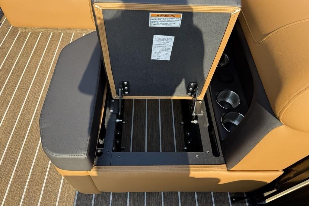 Open storage compartment in 2026 Premier 250 Solaris RS CL boat seat.
