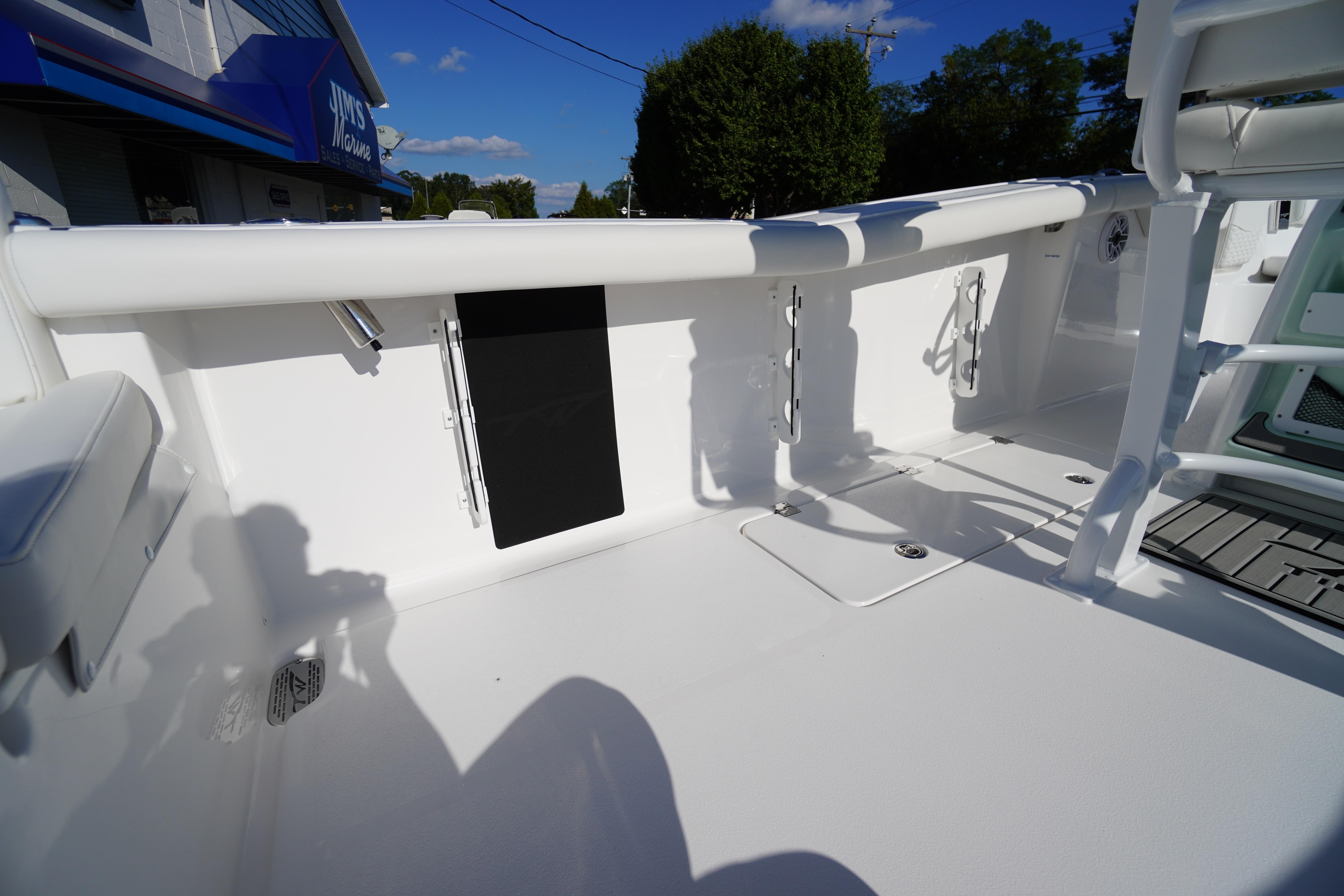 2026 Tidewater 272 LXF boat interior with sleek white deck and seating.