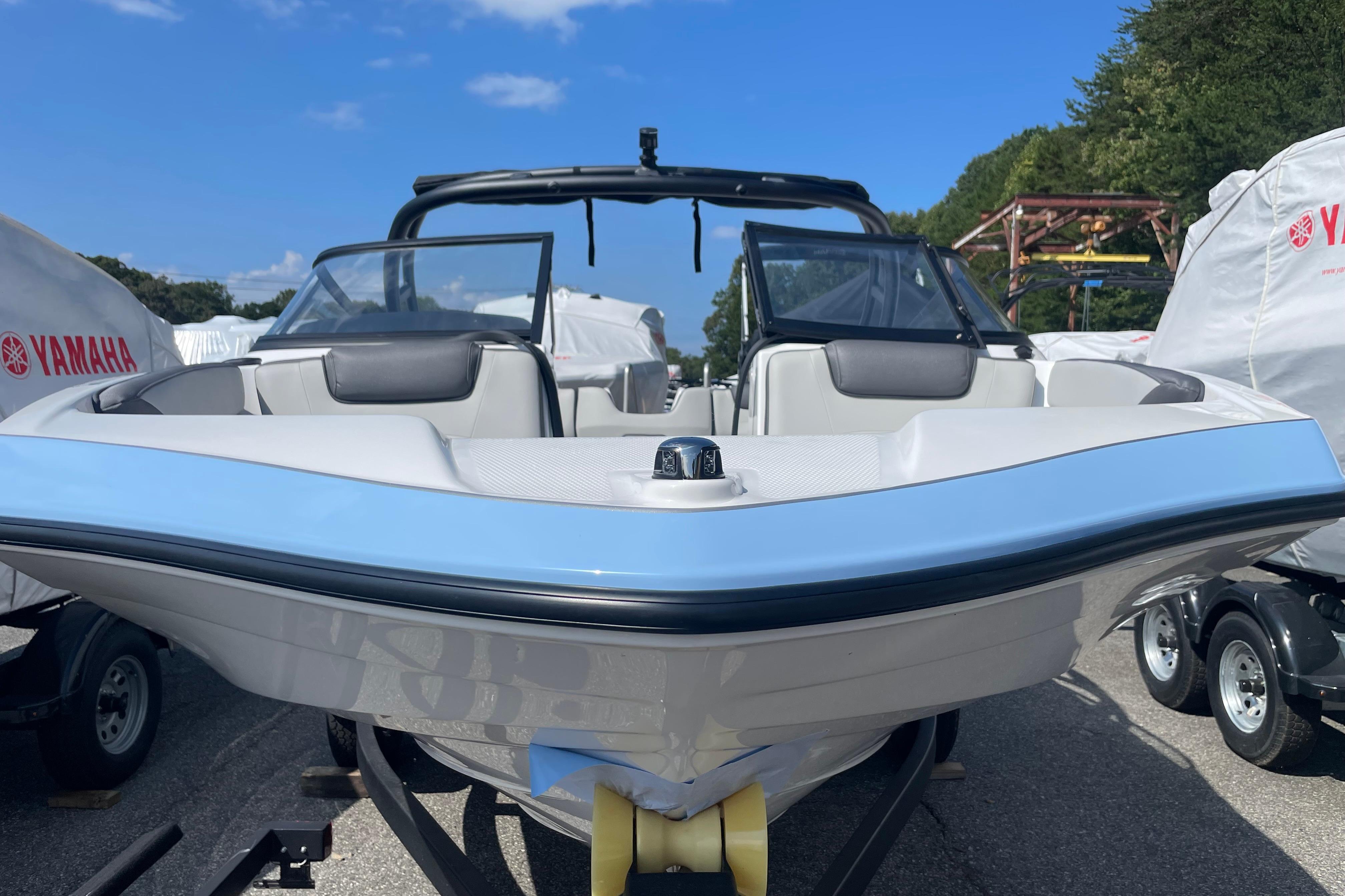2026 Yamaha Boats AR190, sleek design, parked outdoors, clear sky background.
