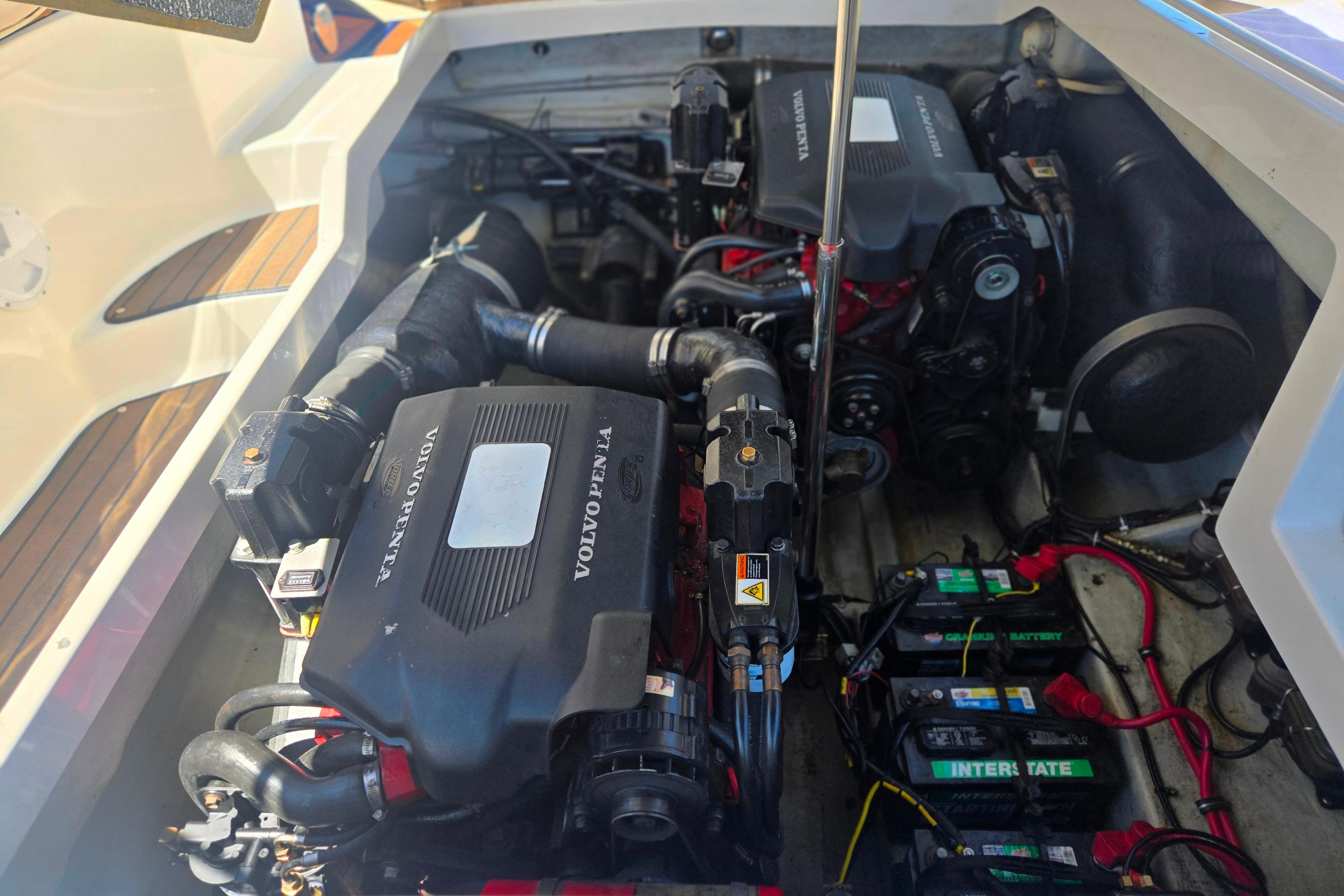 Engine compartment of a 2002 Chris-Craft Launch 28 GT I/O with Volvo Penta engines.