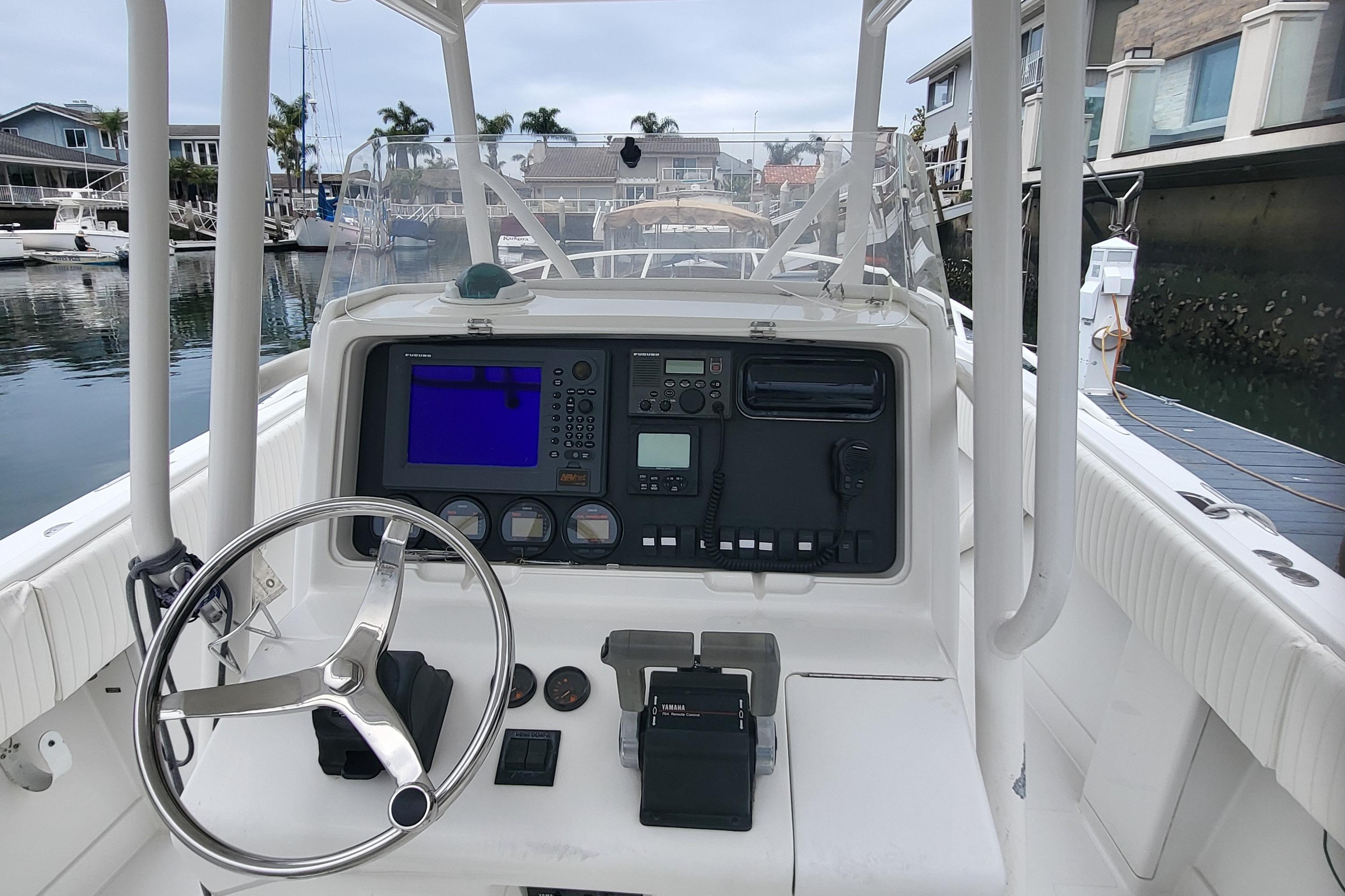 2004 Jupiter 31 Center Console boat dashboard at dock.