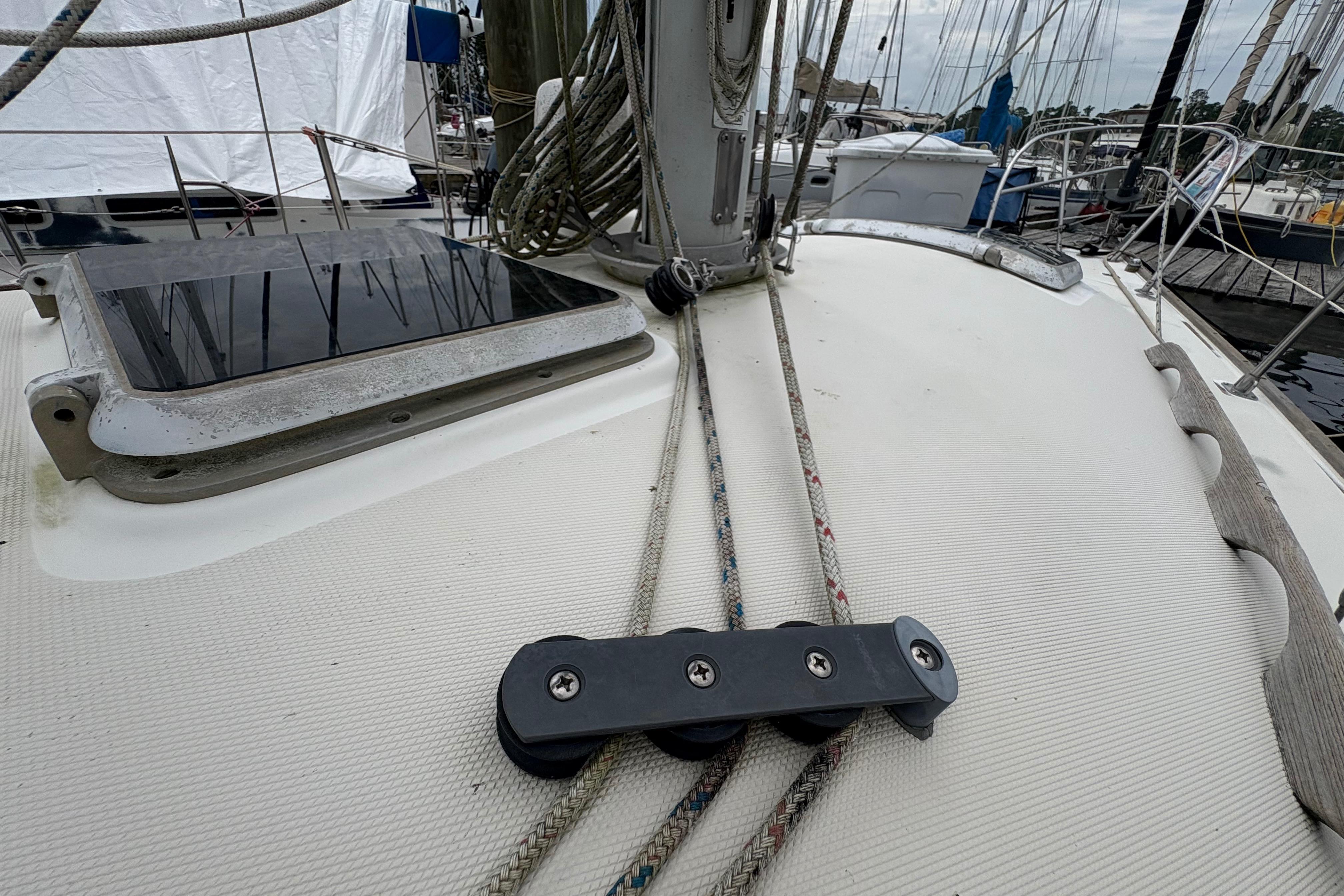 Deck of 1981 Sabre 31 sailboat with rigging and hatch details.