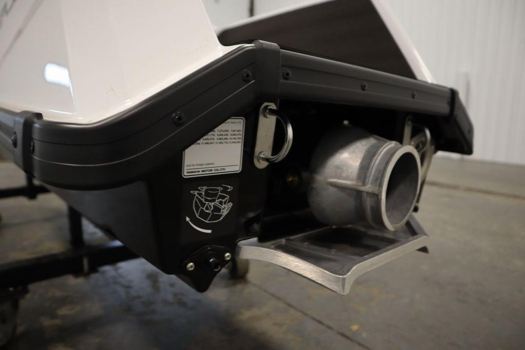 2025 Yamaha WaveRunner SuperJet rear view, showcasing jet propulsion system in a garage setting.