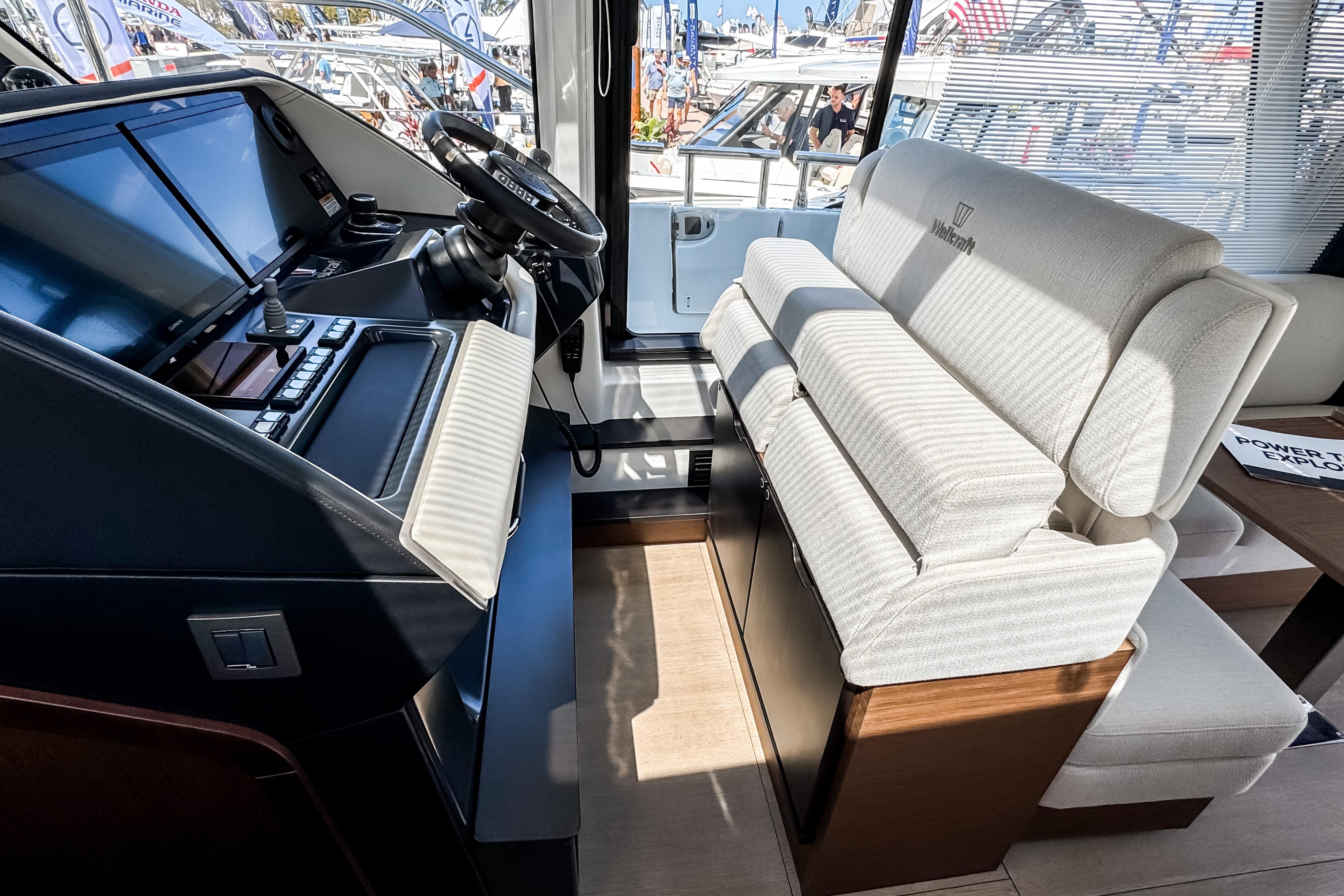 2026 Wellcraft 44 Explorer helm with modern controls and comfortable seating.