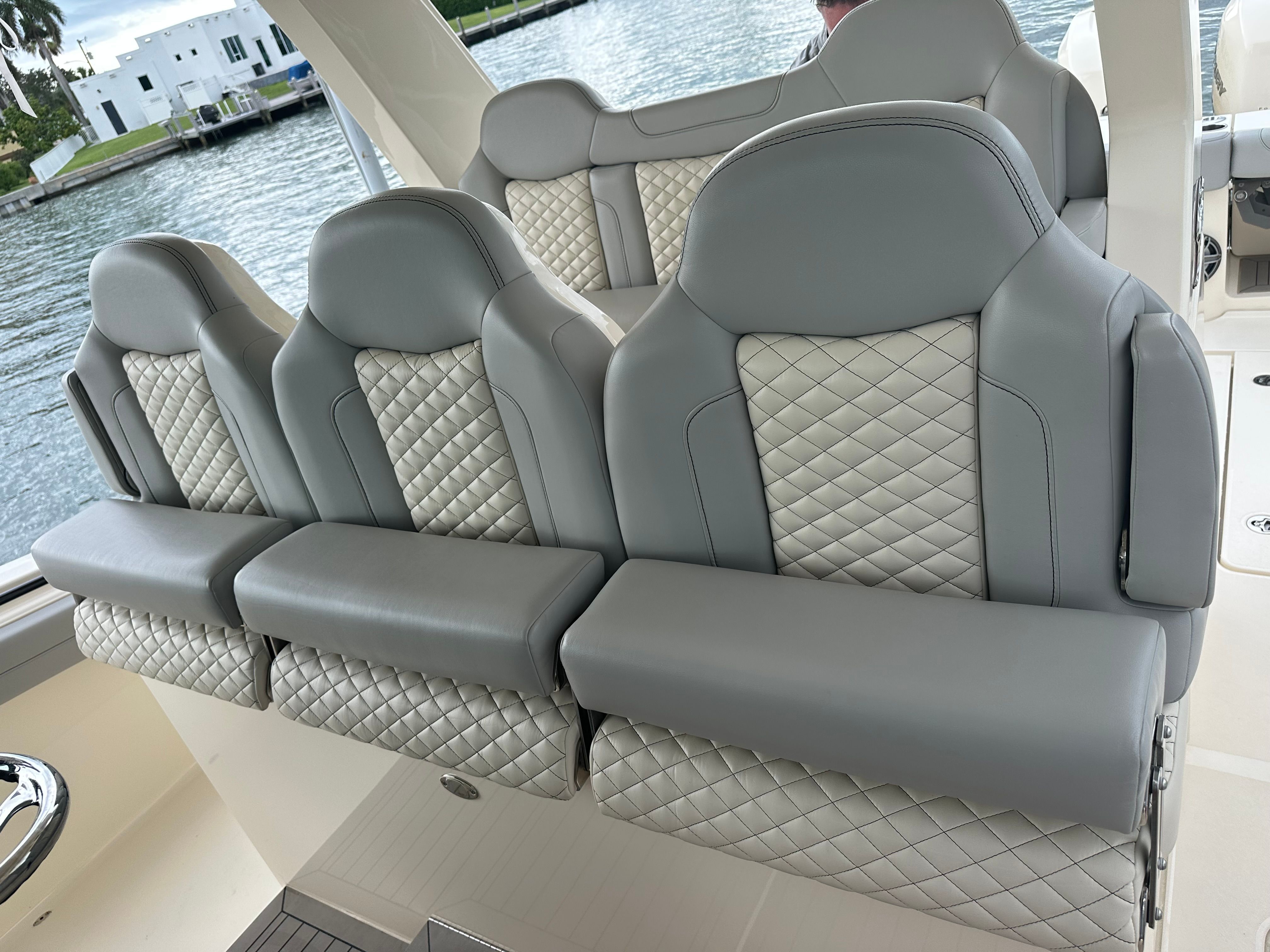 Luxurious seating on a 2022 Scout 425 LXF boat.