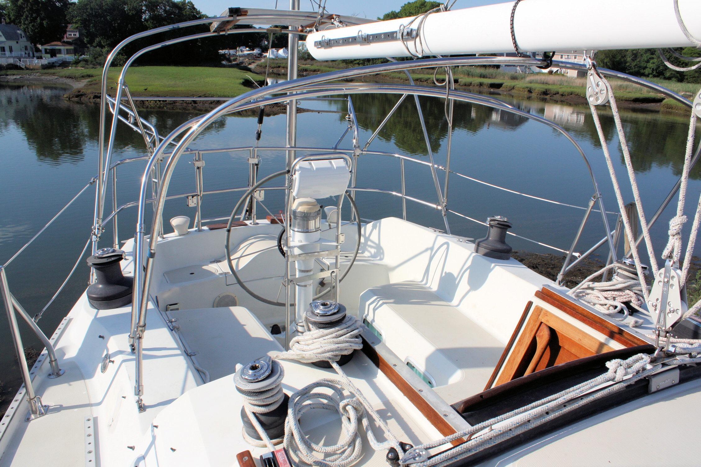 Cockpit view of 1987 Ericson 38-200 sailboat with ropes and winches.