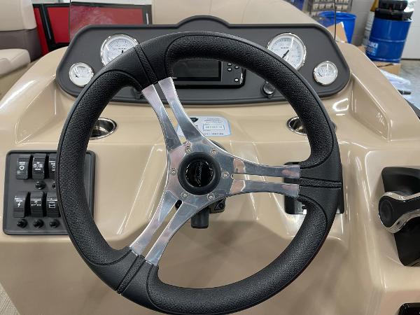 Steering wheel and dashboard of 2025 Bentley Pontoons 200 Fish-N-Cruise boat.