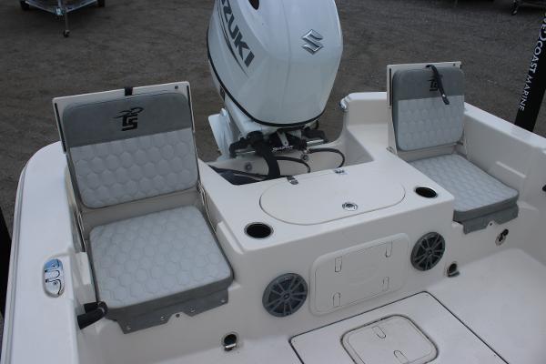 2025 Carolina Skiff 23 LS boat interior with Suzuki engine and seating.