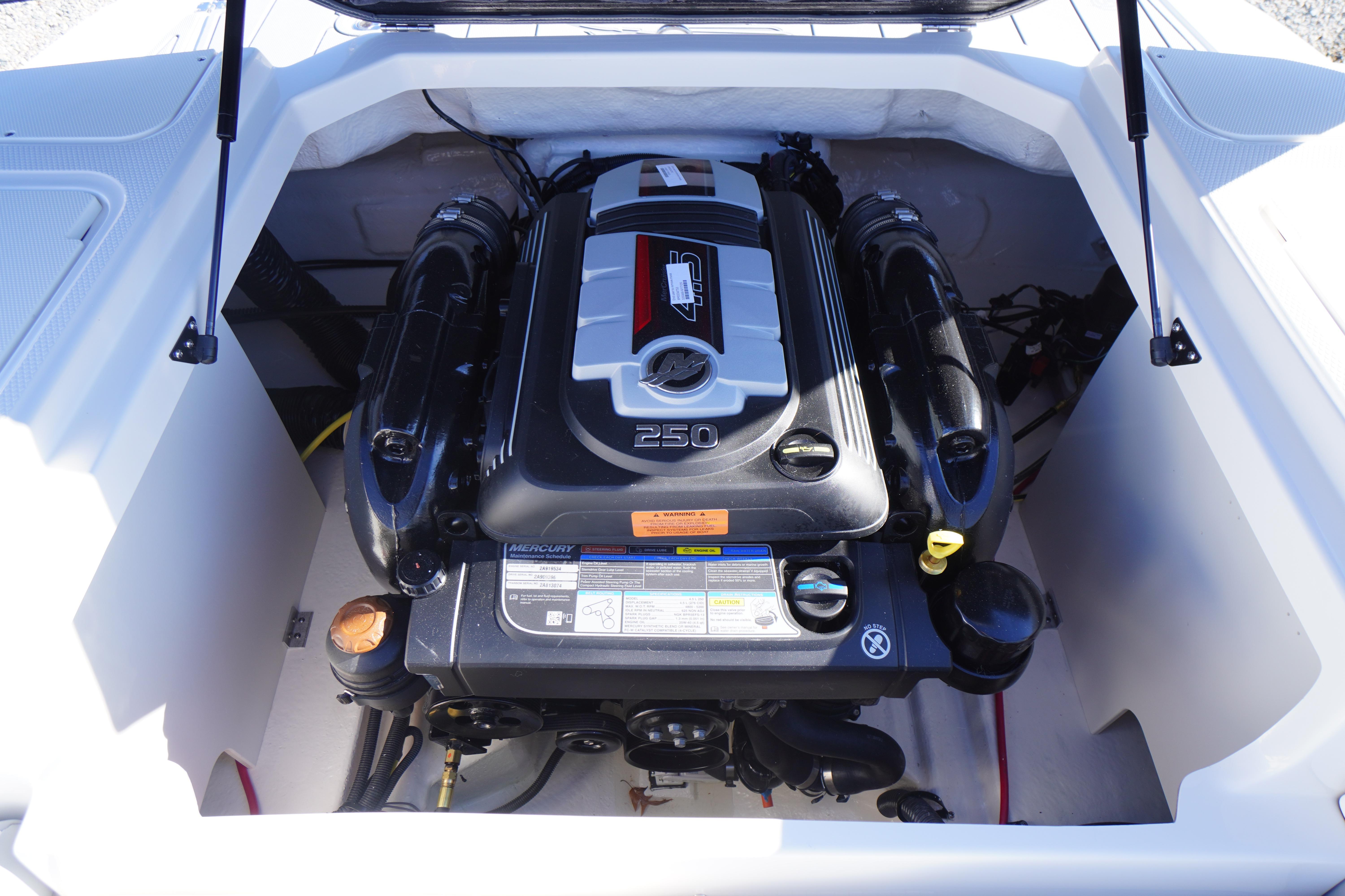 2026 Chaparral 23 SSi boat engine compartment with Mercury 250 engine.