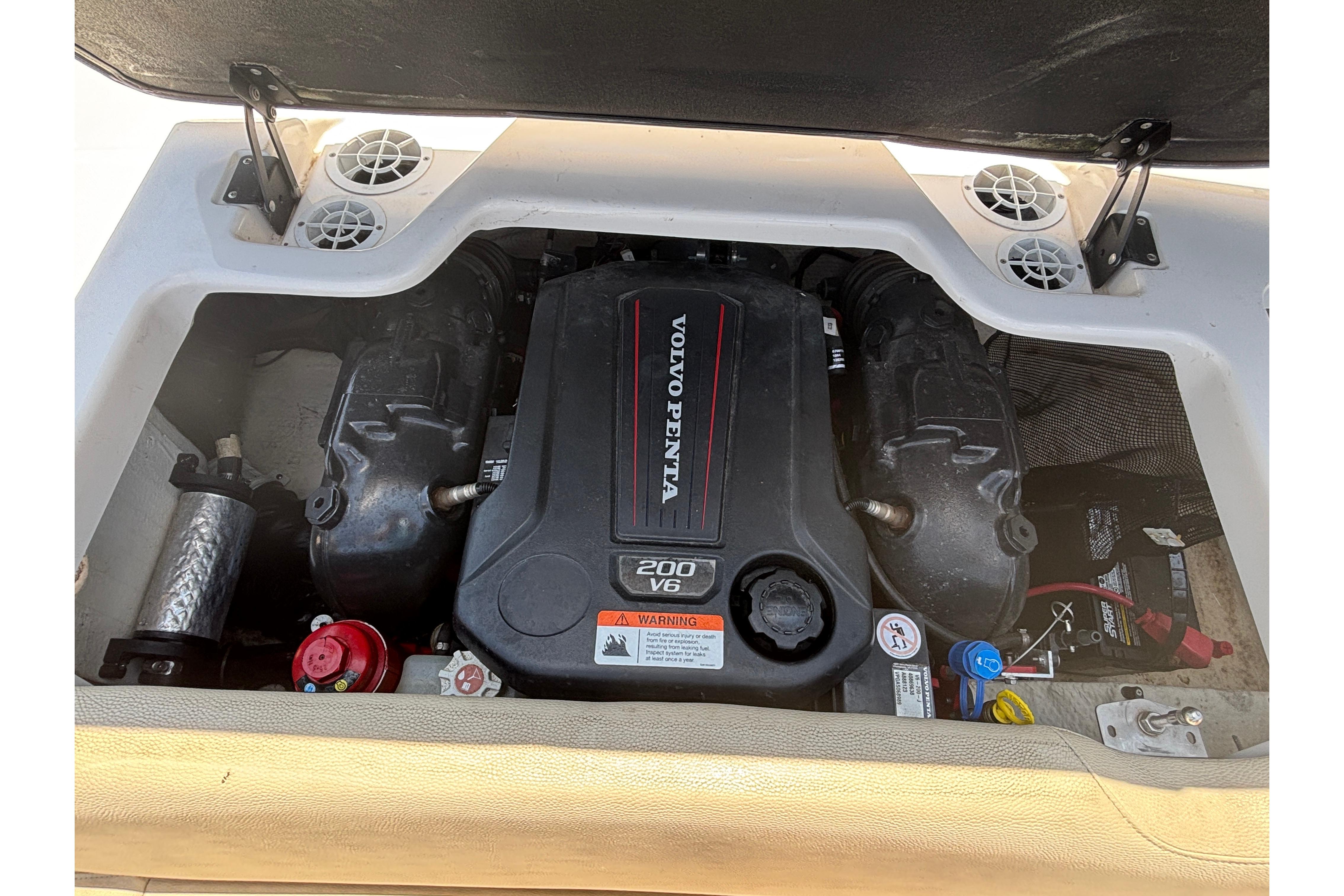 Engine compartment of a 2018 Regal 1900 ES Bowrider with Volvo Penta 200 V6 engine.