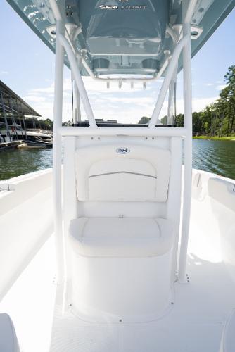 2024 Sea Hunt Ultra 234 boat interior with white seating and console.