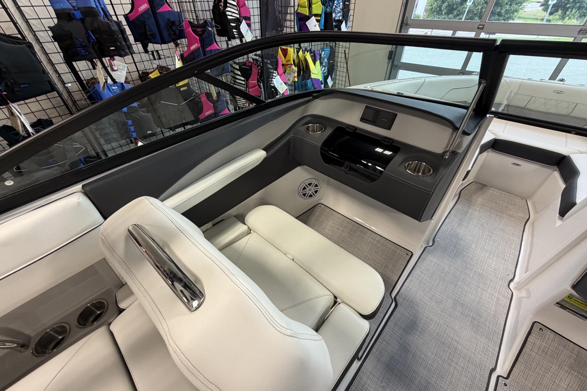 Interior of a 2027 Regal LS2 boat, featuring sleek seating and modern dashboard design.