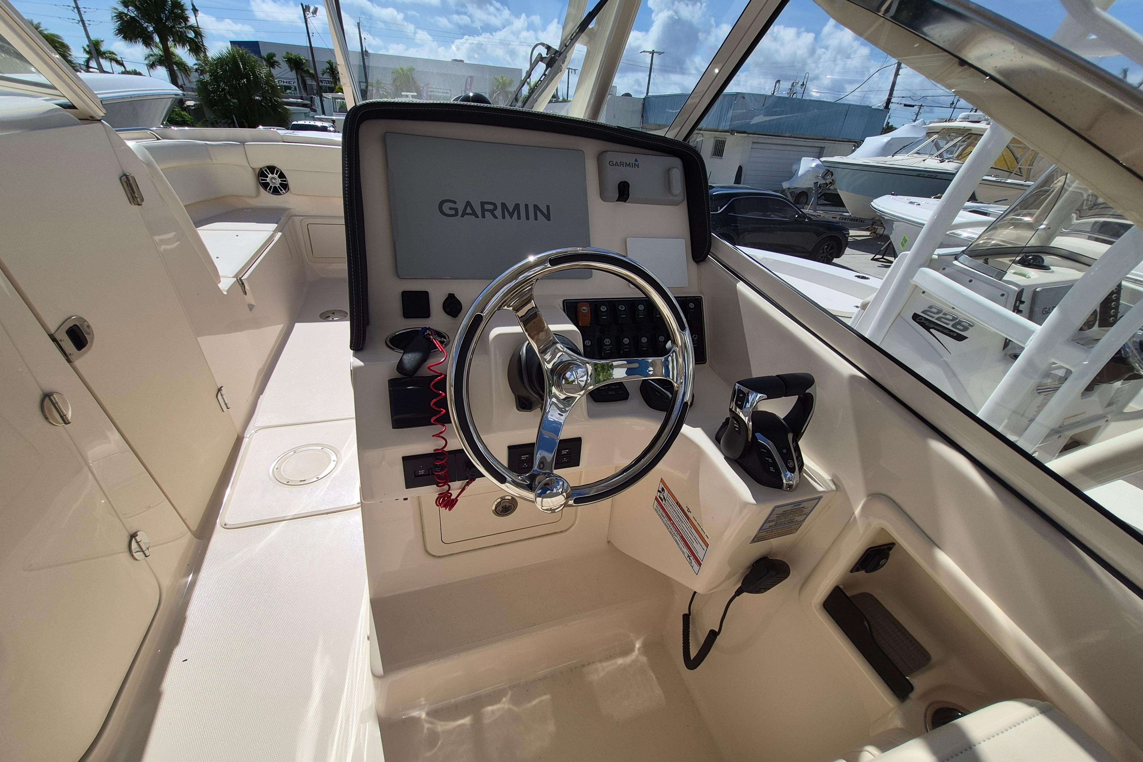 Helm of 2025 Grady-White Freedom 275 boat with Garmin navigation system.