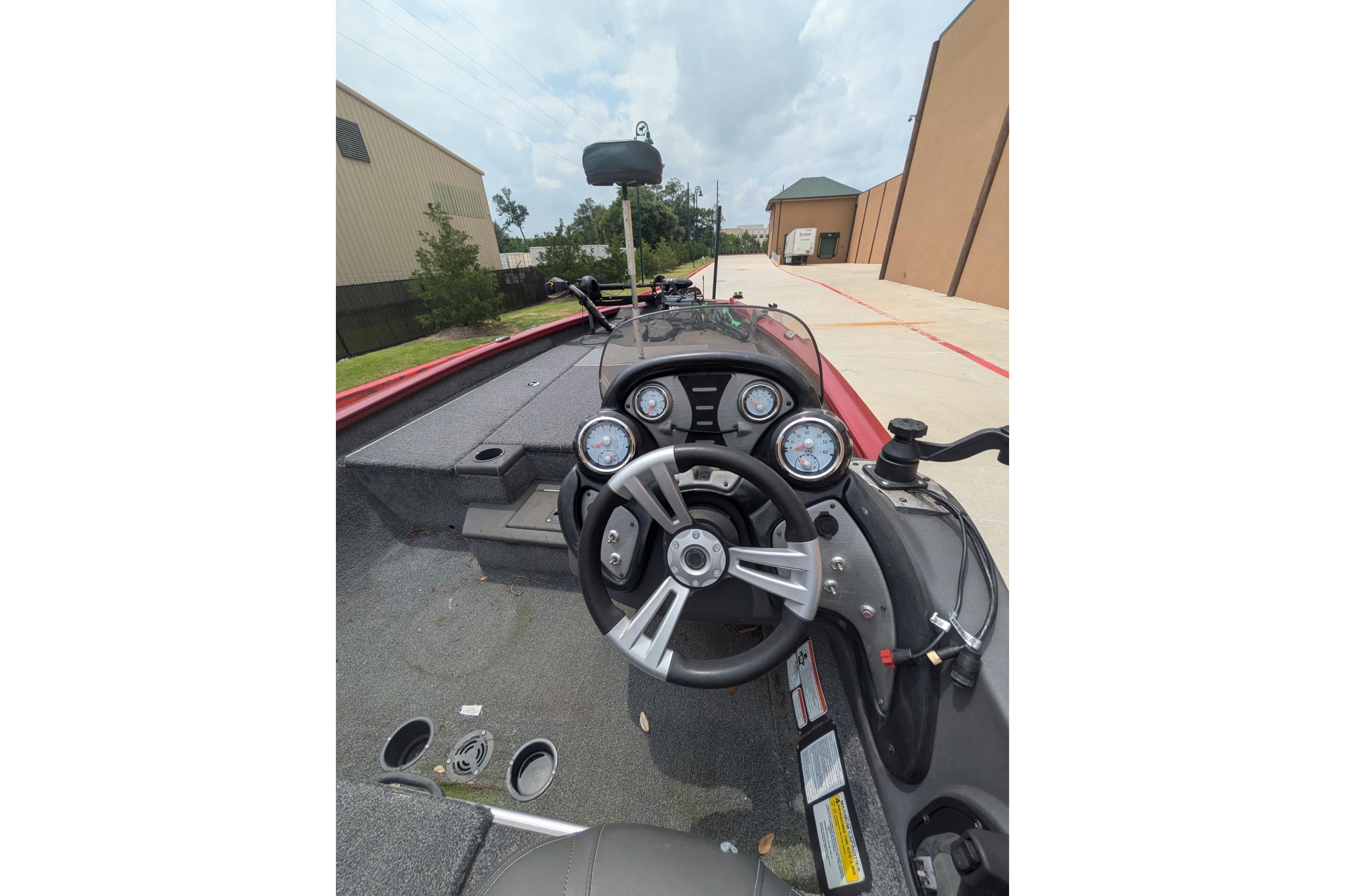 2019 Tracker Pro Team 190 boat dashboard with steering wheel and gauges.