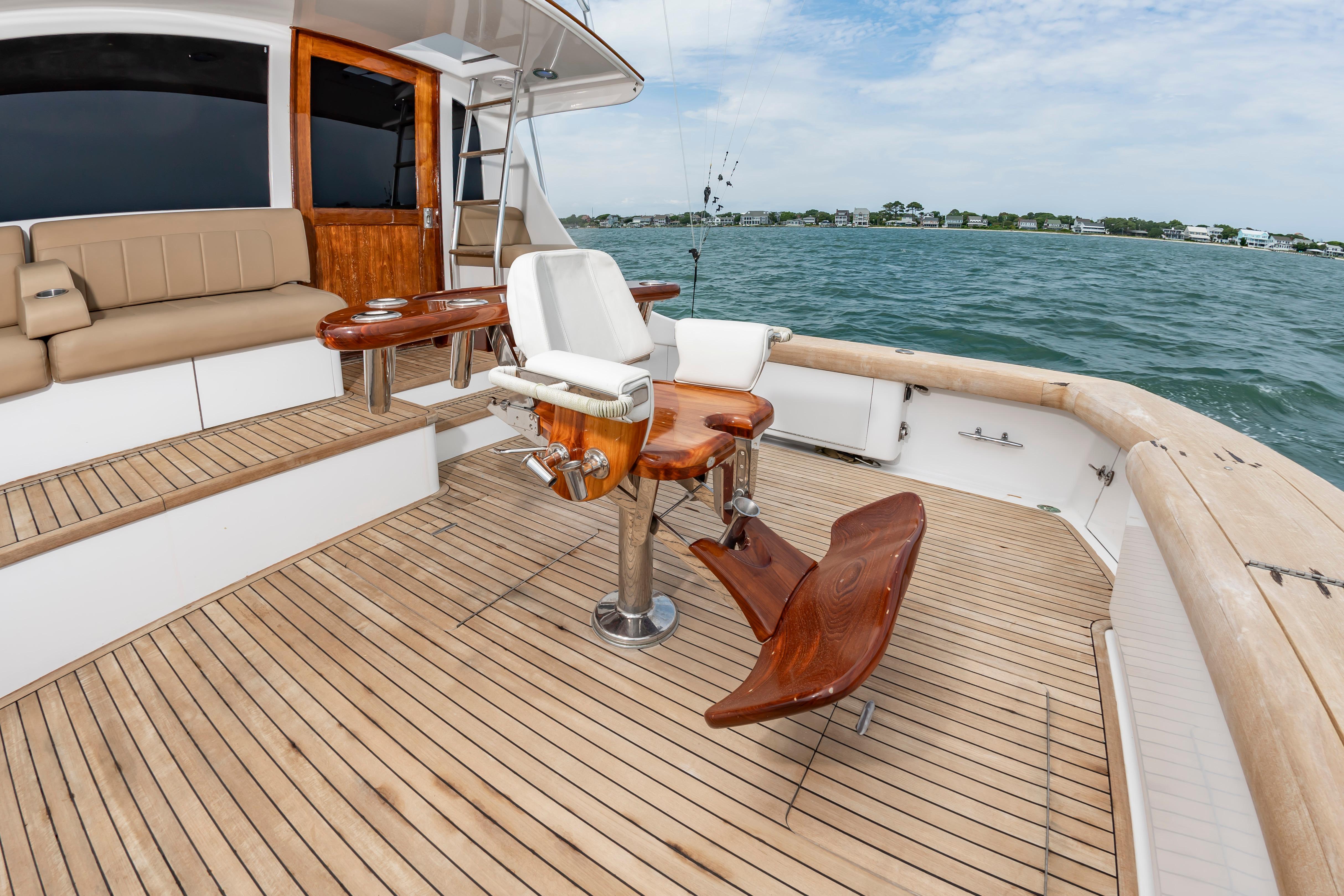 Custom Carolina Scarborough 56 Convertible 1993 yacht deck with fishing chair and ocean view.