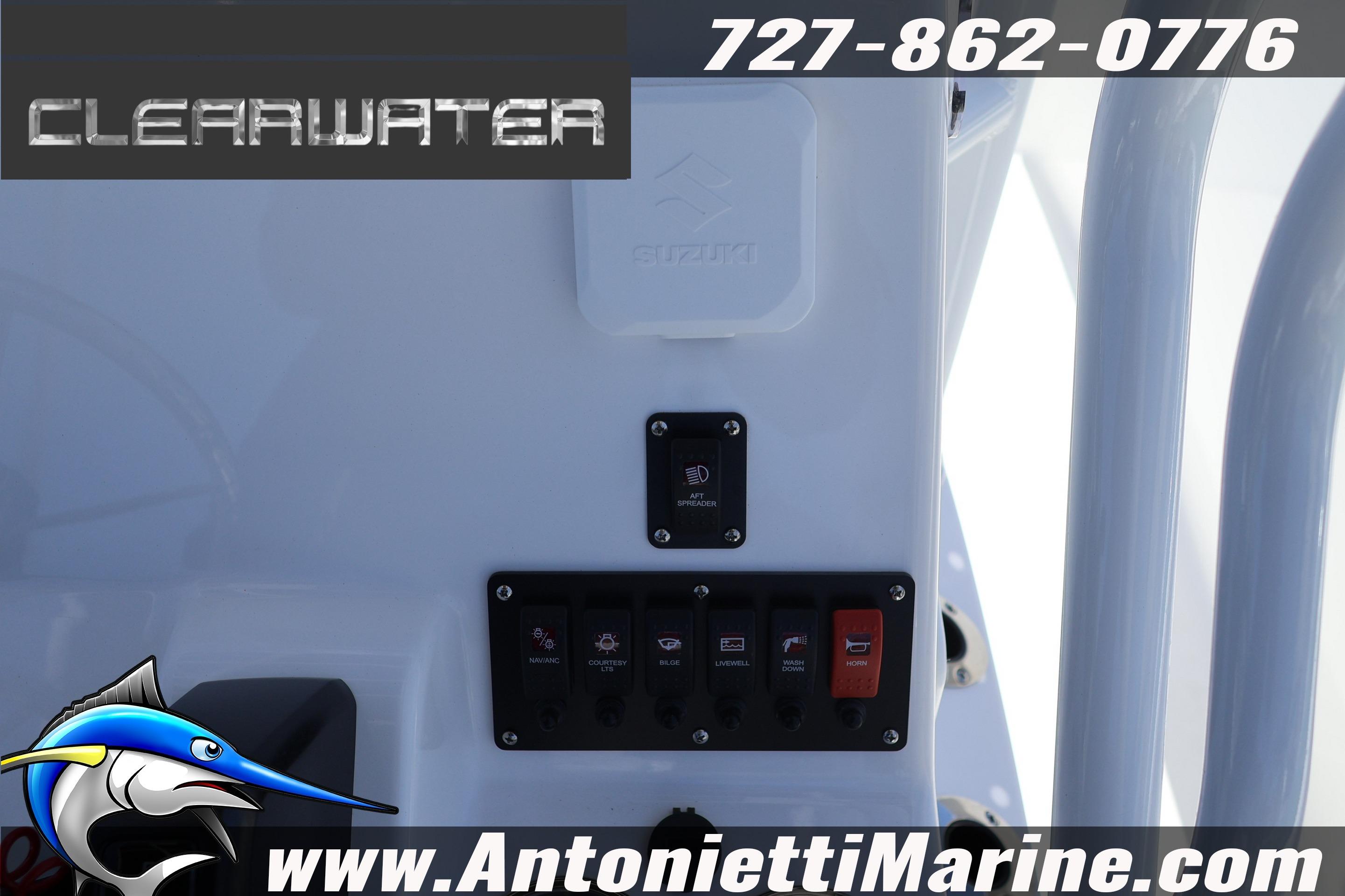 Clearwater 2000 Center Console 2026 boat dashboard with controls and logo.